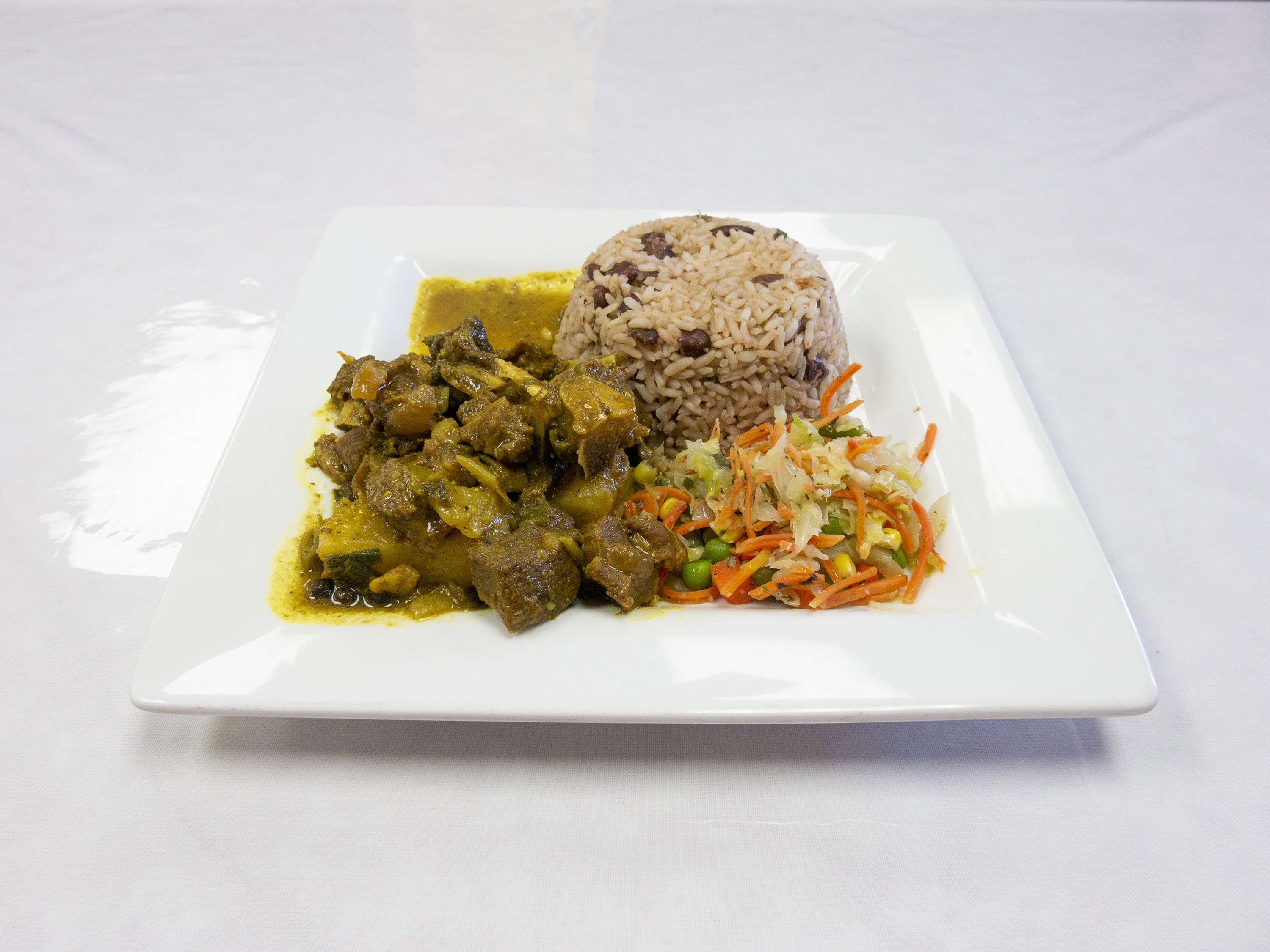 Order Curry Goat food online from Cool Vybz store, Phoenix on bringmethat.com