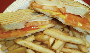 Order Grilled Cheese and Tomatoes Panini food online from Tharsy Grill store, Baltimore on bringmethat.com