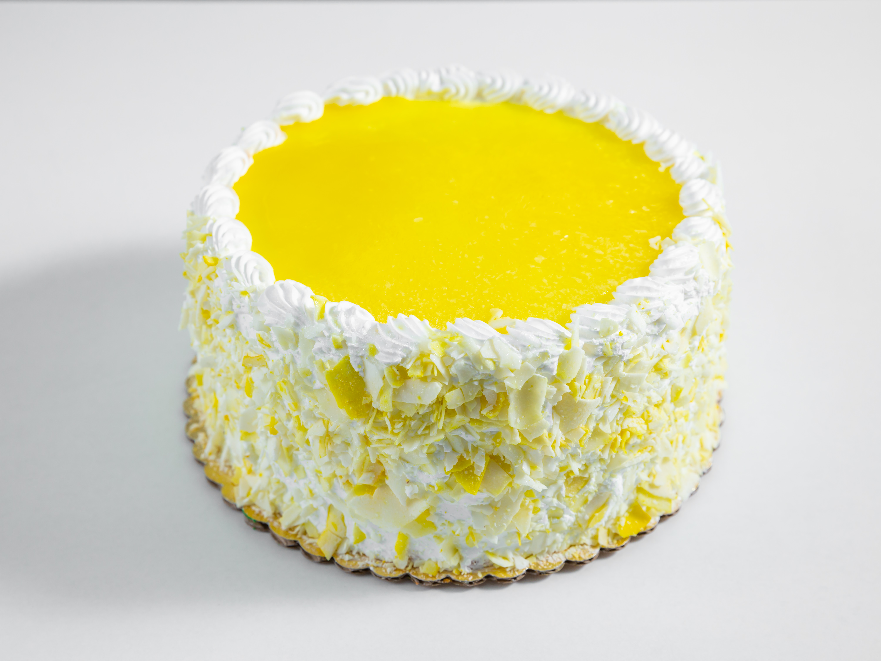 Order Lemon Mousse Cake food online from It A Piece A Cake store, San Diego on bringmethat.com