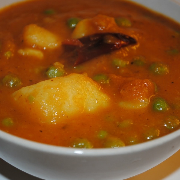 Order Aloo Matar food online from India's Tandoori Restaurant store, Burbank on bringmethat.com