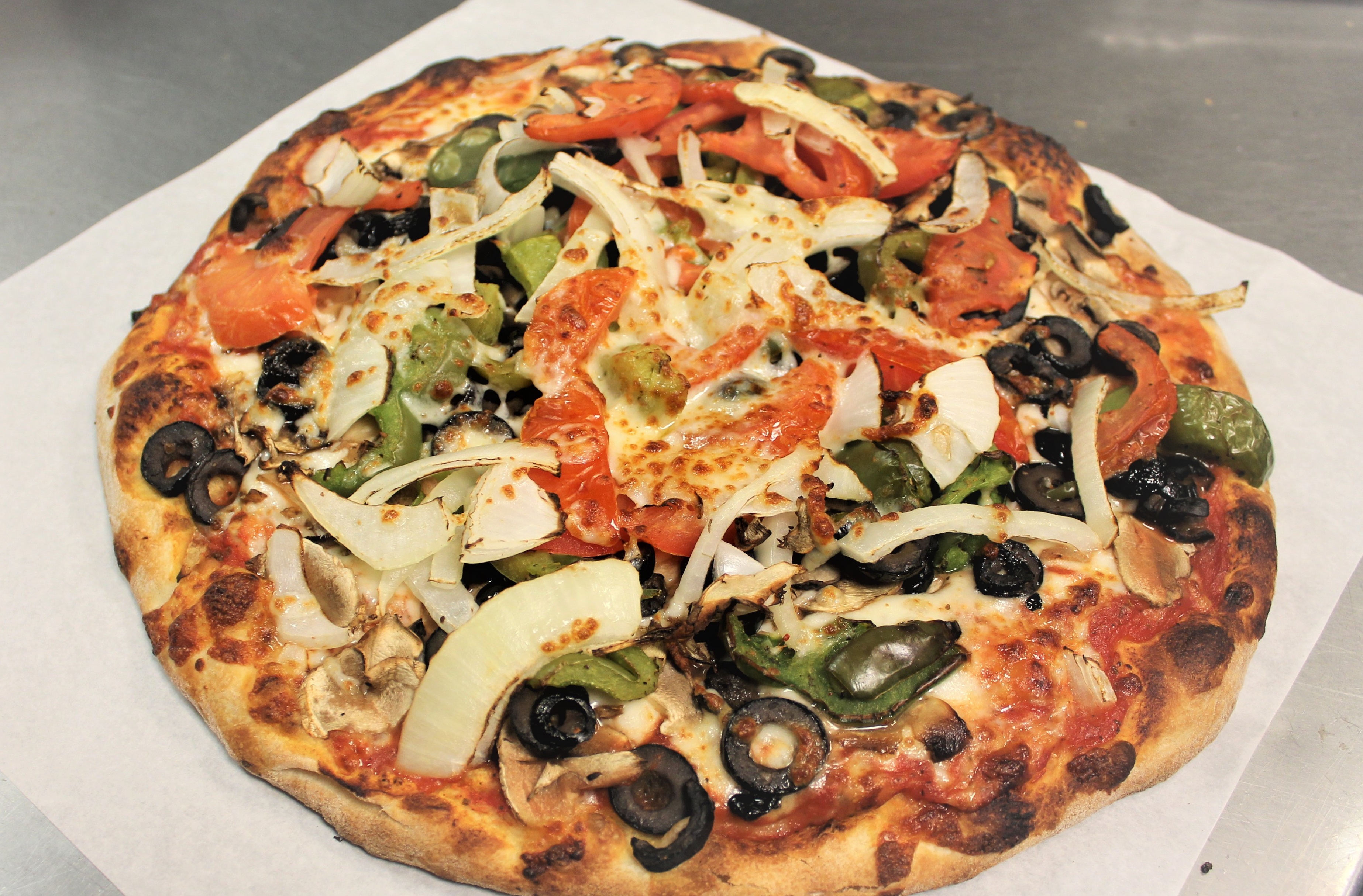 Order Veggie Pizza food online from Tony Pizza & Pasta store, Oak Park on bringmethat.com