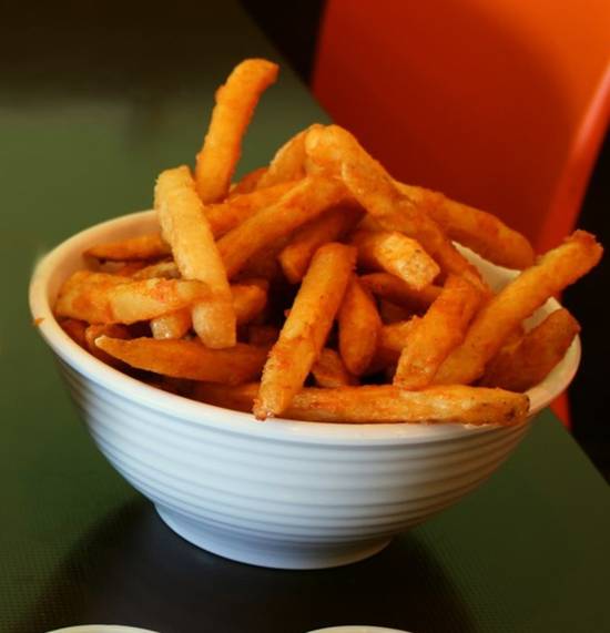 Order Side of Cajun Fries food online from Holy Schnitzel store, New York on bringmethat.com