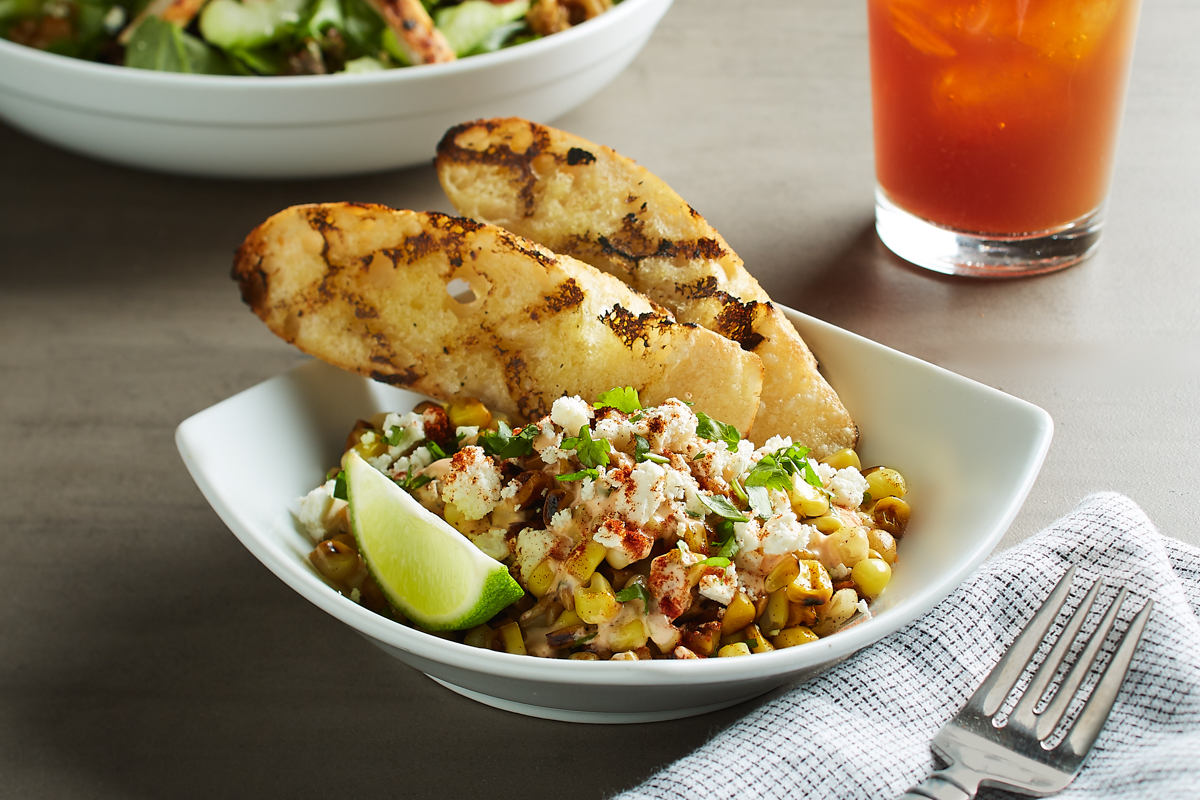 Order Mexican Street Corn food online from California Pizza Kitchen - River City Dr store, Jacksonville on bringmethat.com