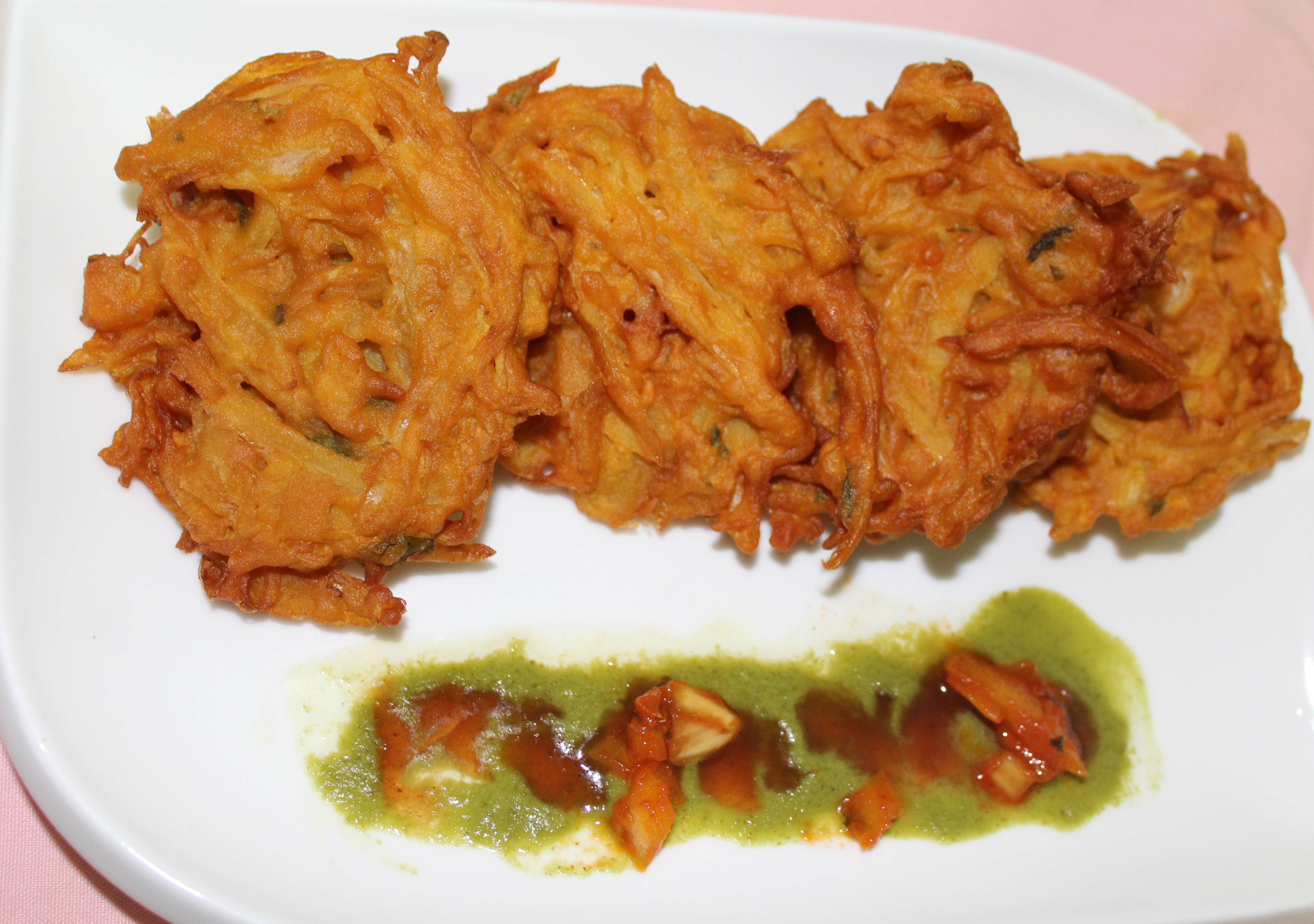 Order 3. Onion Bhujia food online from Ashoka grill store, Brooklyn on bringmethat.com