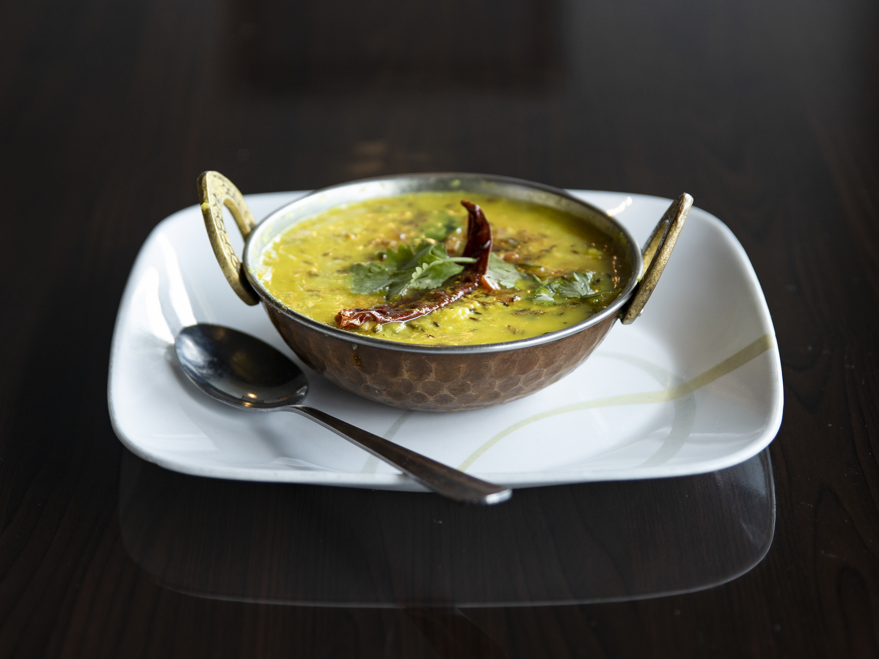 Order Tadka Daal food online from Amans Indian Bistro store, Chalfont on bringmethat.com