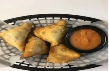 Order 4 Piece Veggie Samosas food online from African Grill And Bar store, Denver on bringmethat.com