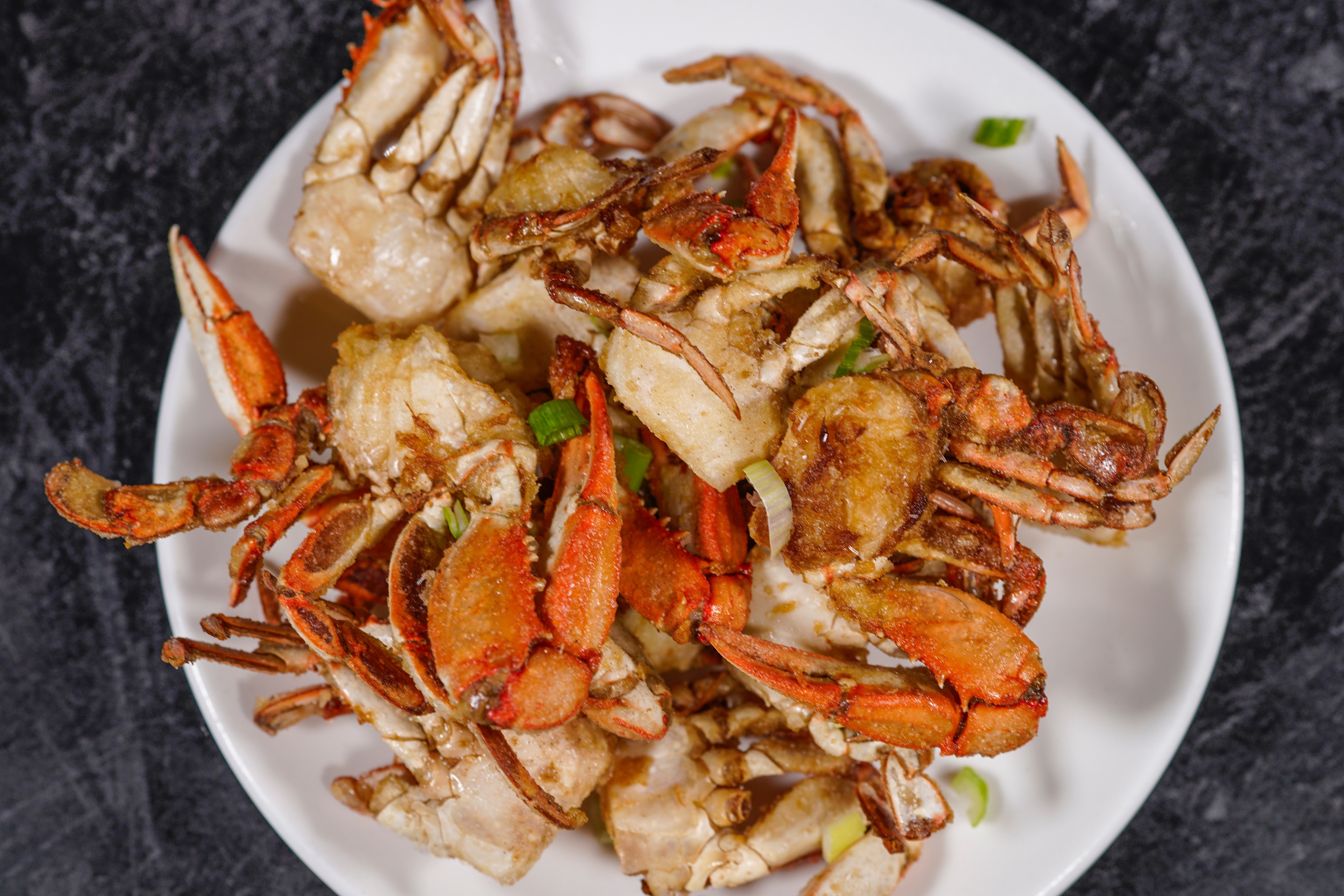 Order GK Salt Pepper Crab food online from Golden Koi Buffet store, Roseville on bringmethat.com
