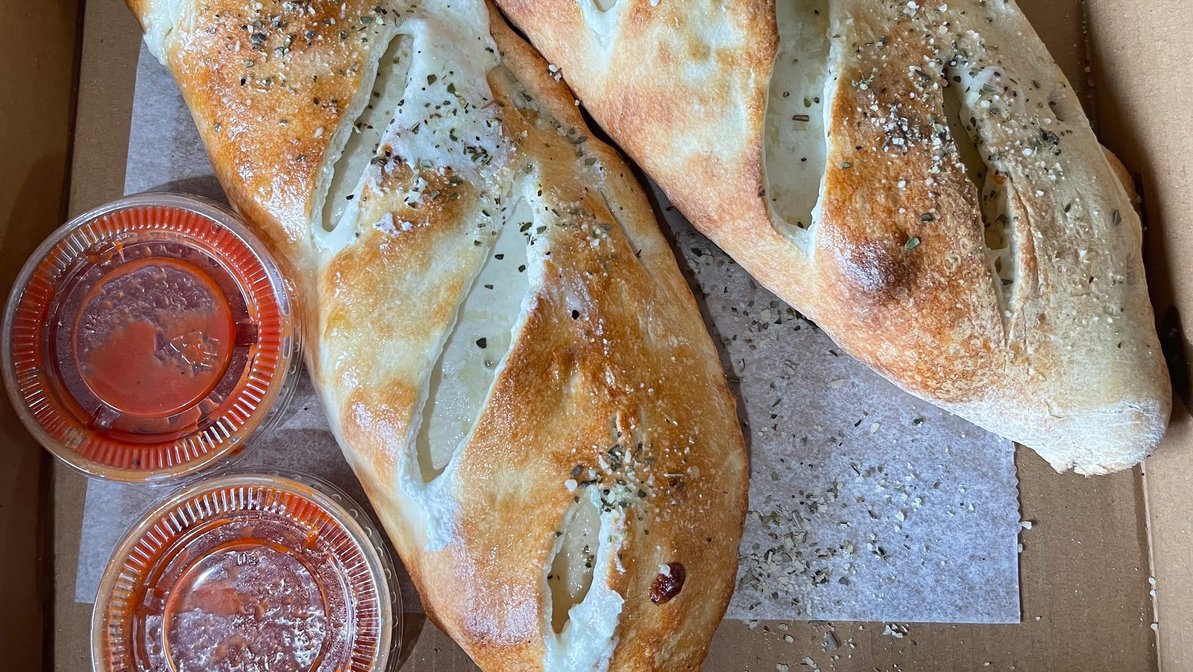 Order Ham Calzone food online from Two Cousins Pizza and Italian Restaurant store, Lancaster on bringmethat.com