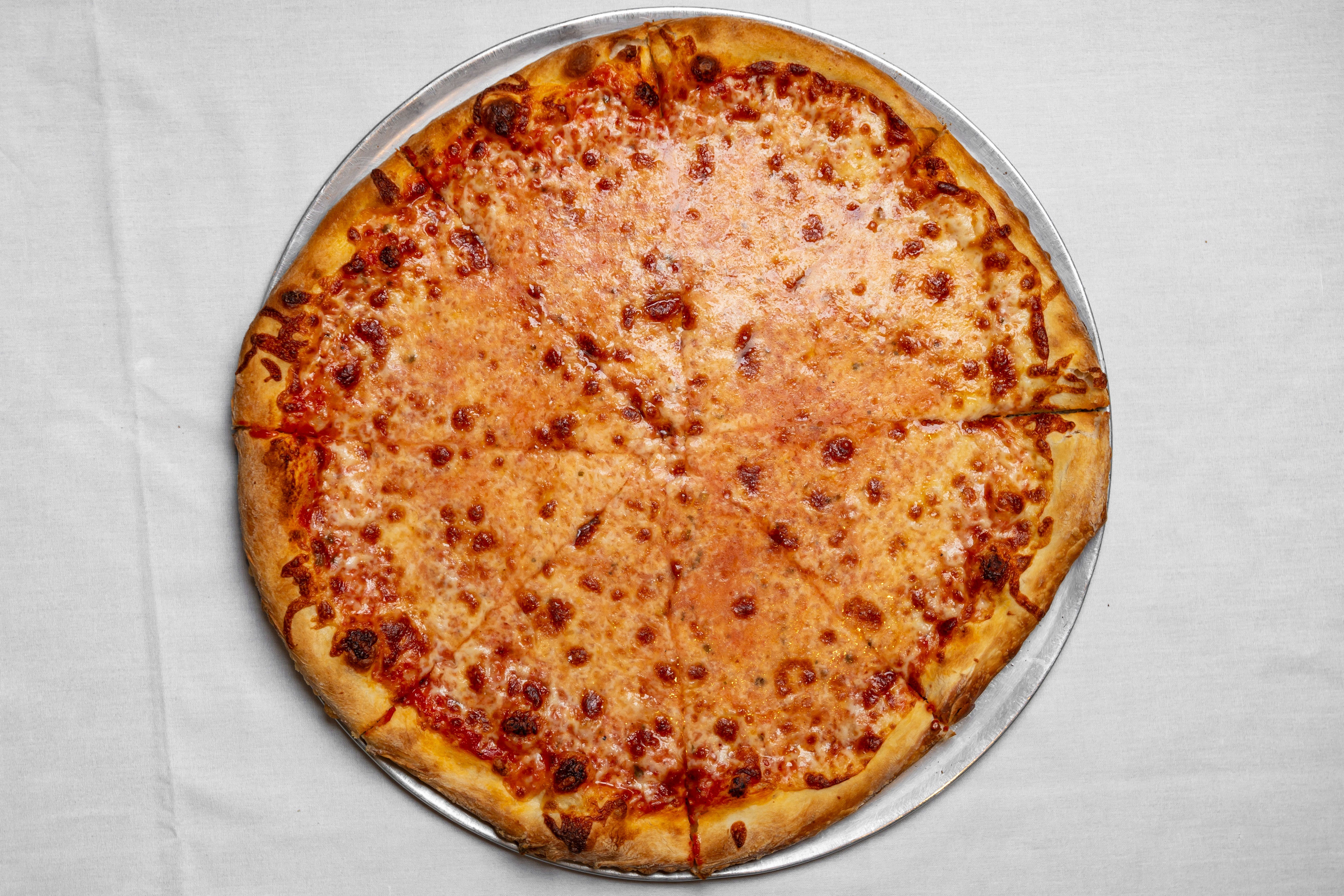 Order Cheese Pizza - Large food online from Mancino's Pizza & Italian Cuisine store, Denville on bringmethat.com