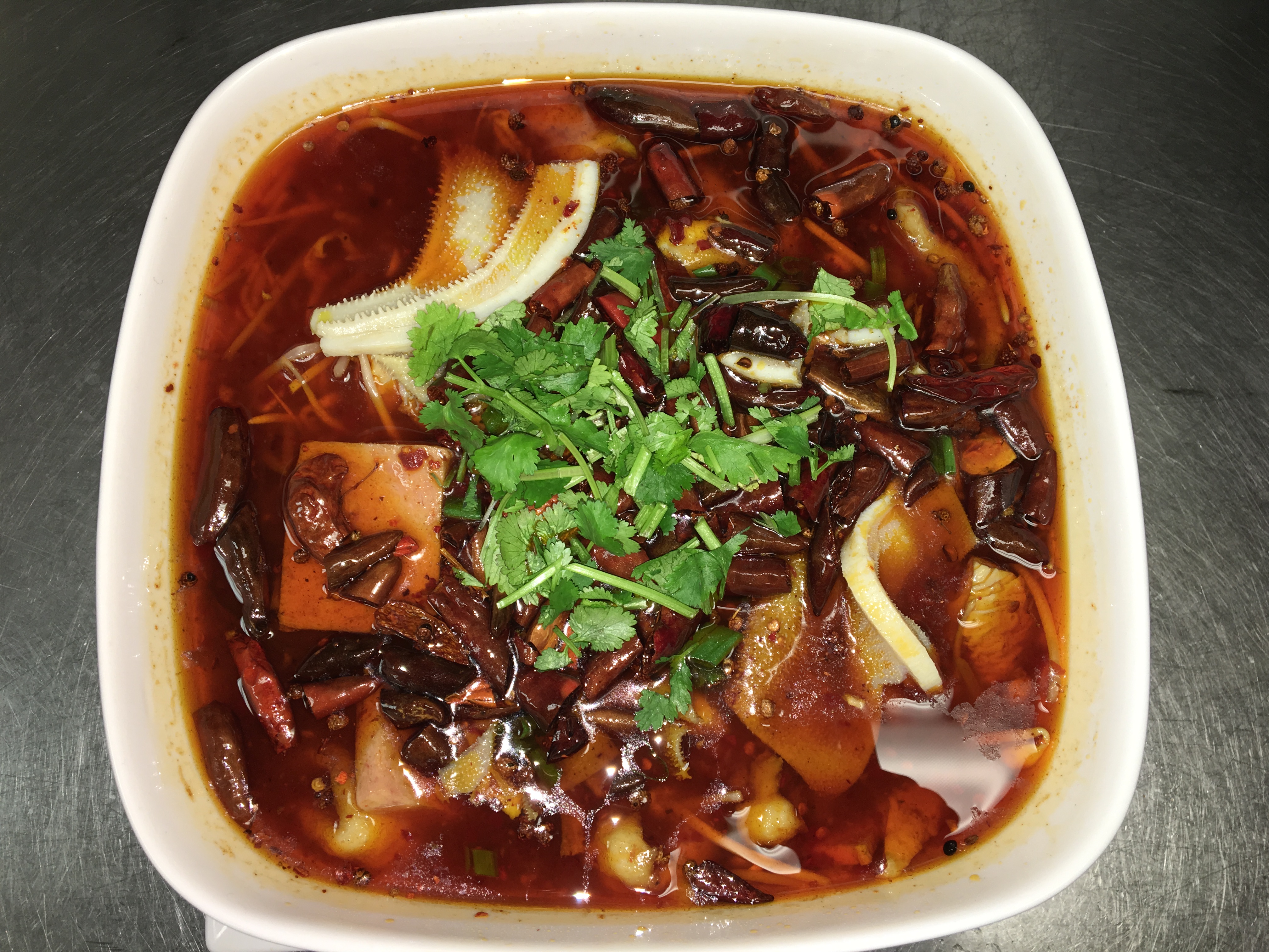 Order F23. Pork Blood, Intestines, Fish Fillet, Beef, Bean Sprout in Hot Chili Oil Sauce 毛血旺 food online from Red Chili store, Vestal on bringmethat.com