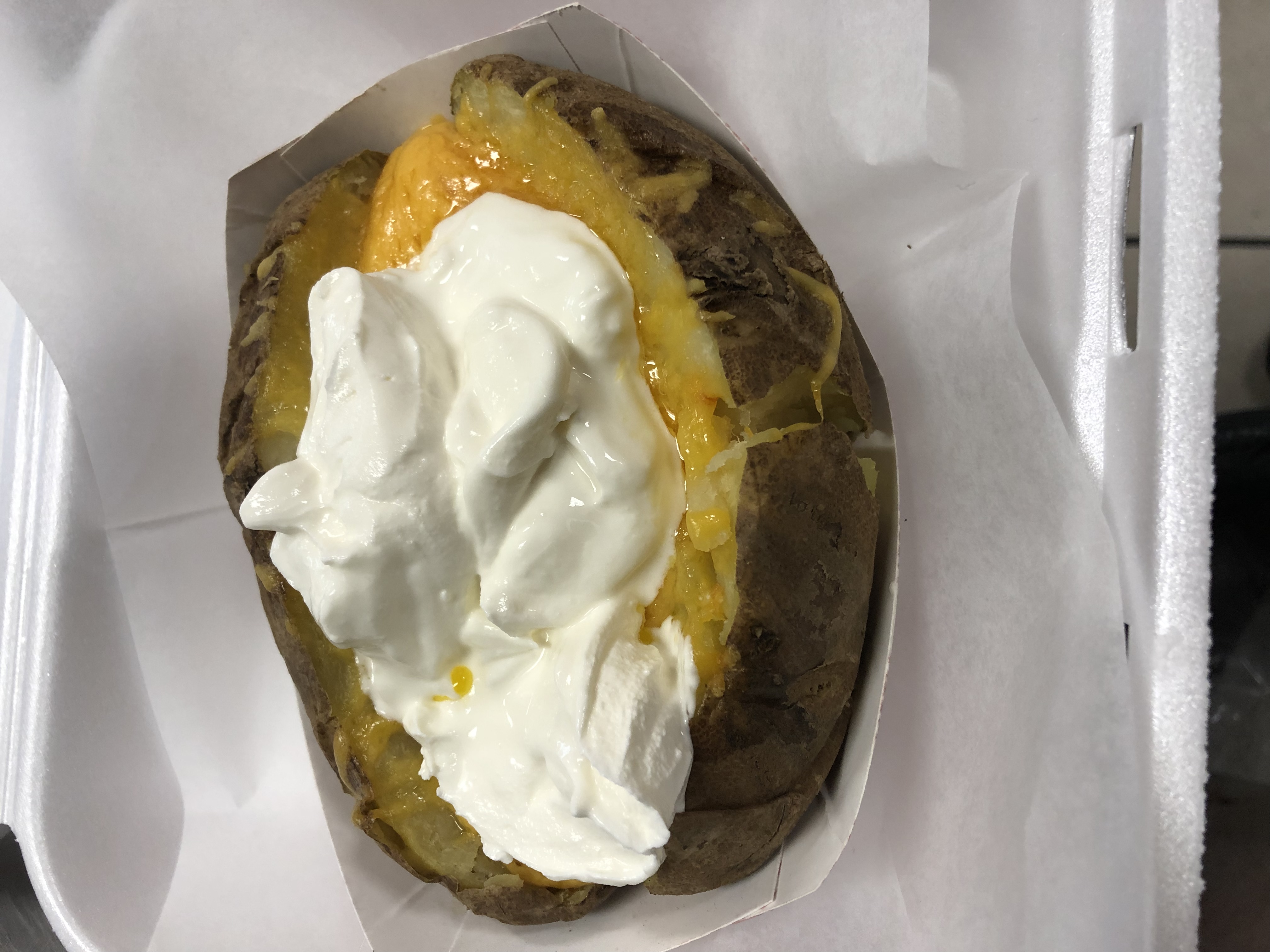 Order Baked Potato with Sour Cream and Cheese food online from Westridge Hots store, Rochester on bringmethat.com