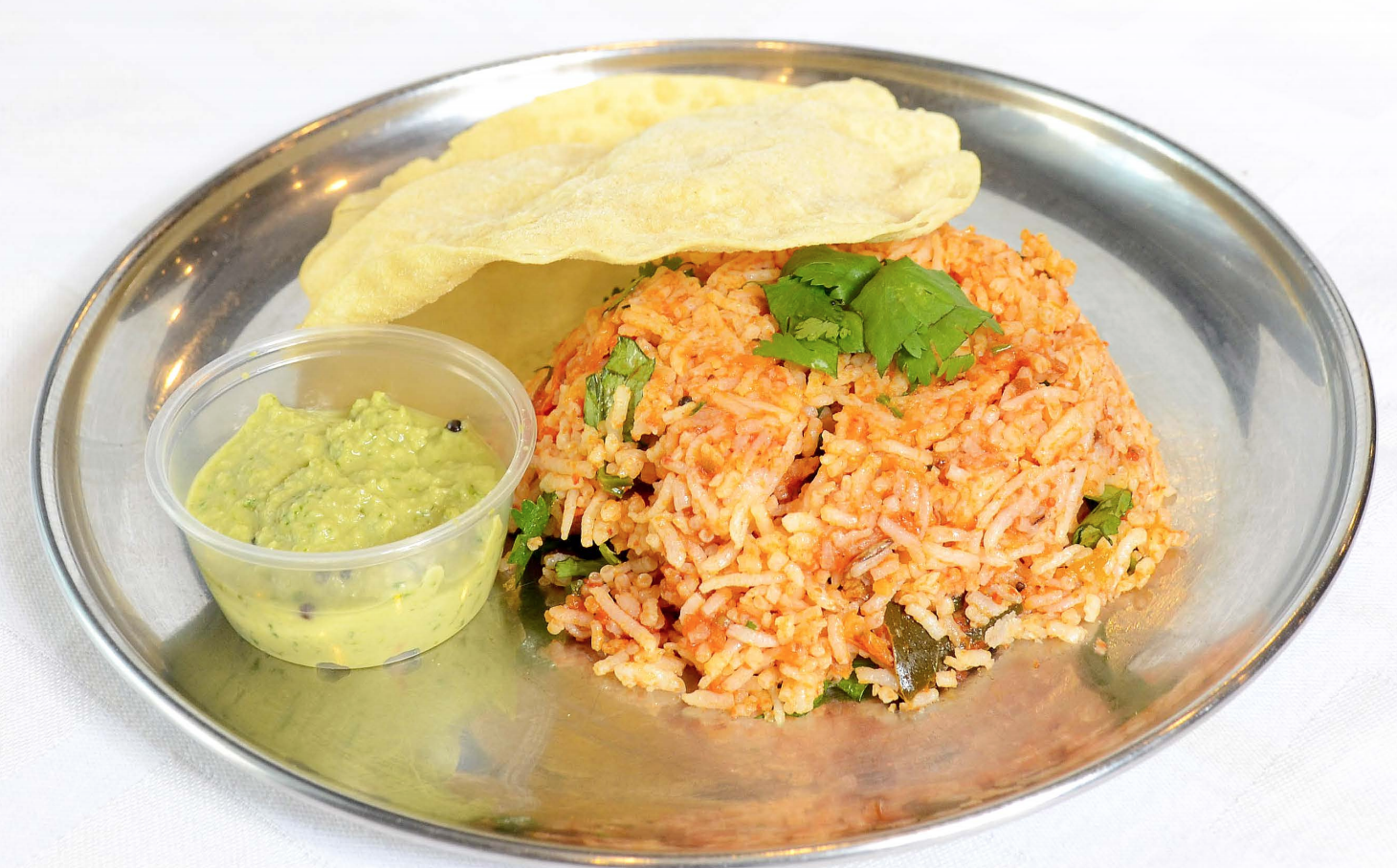 Order Tomato Rice food online from Shri Balaji Bhavan store, Houston on bringmethat.com