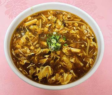 Order Hot  and Sour Soup food online from Canaan Restaurant store, Artesia on bringmethat.com