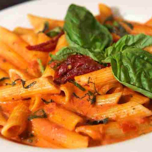 Order Penne Vodka - Pasta food online from Urban Tomato store, Palisades Park on bringmethat.com