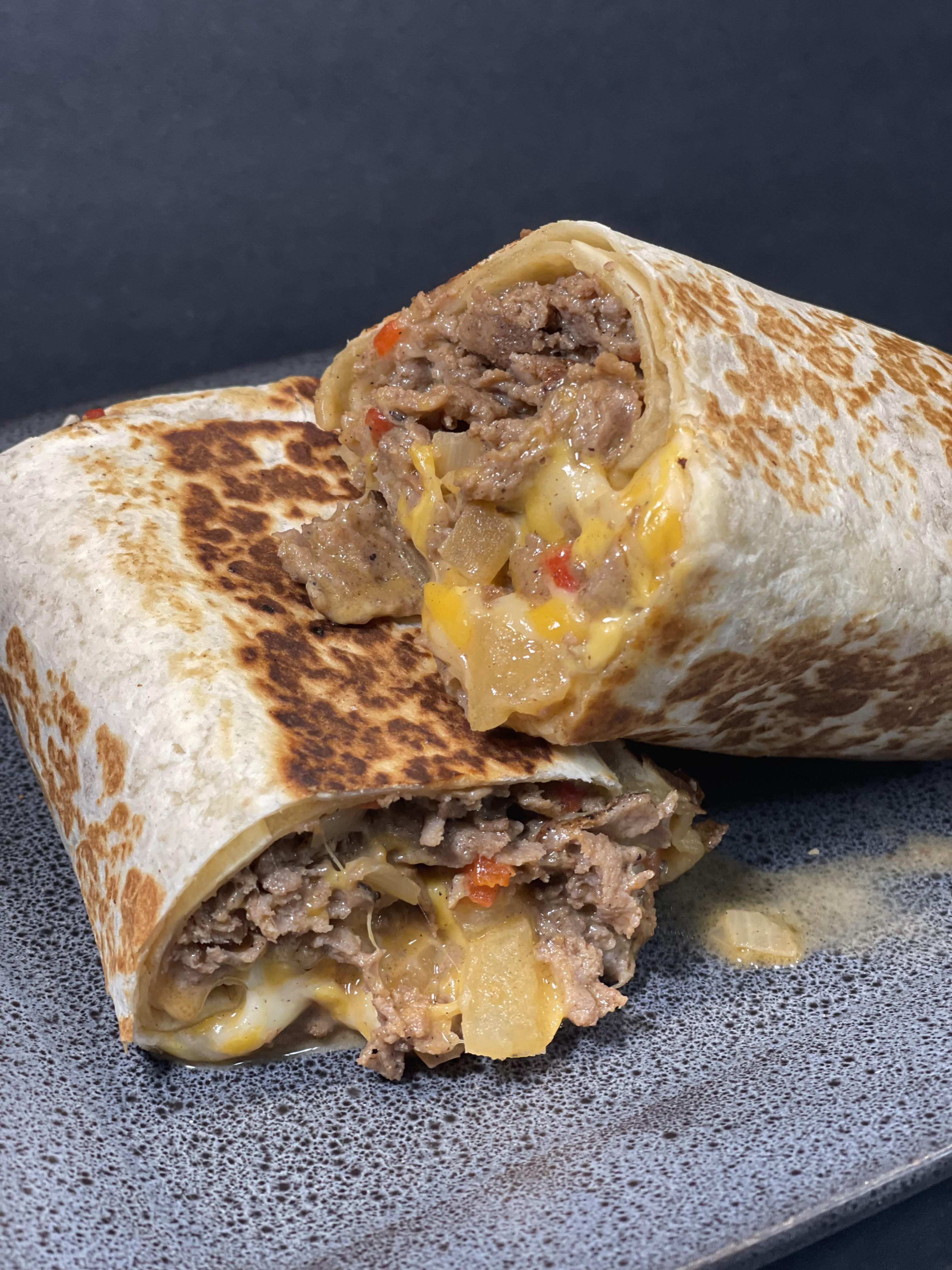 Order Signature PHILLY CHEESE STEAK WRAP food online from Valley Fresh store, West Orange on bringmethat.com
