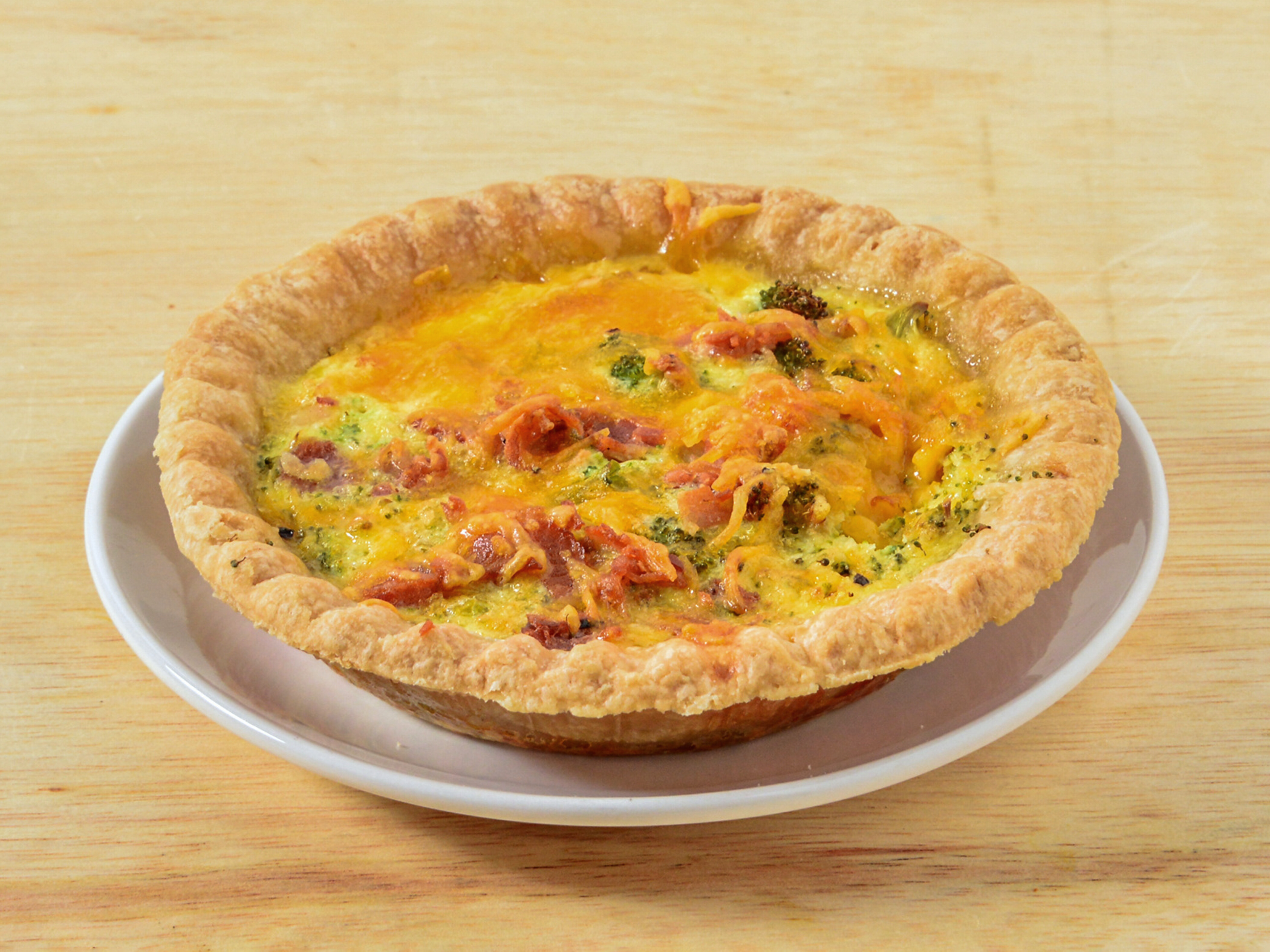 Order House Made Quiche food online from Live Oak Coffeehouse store, Bay City on bringmethat.com