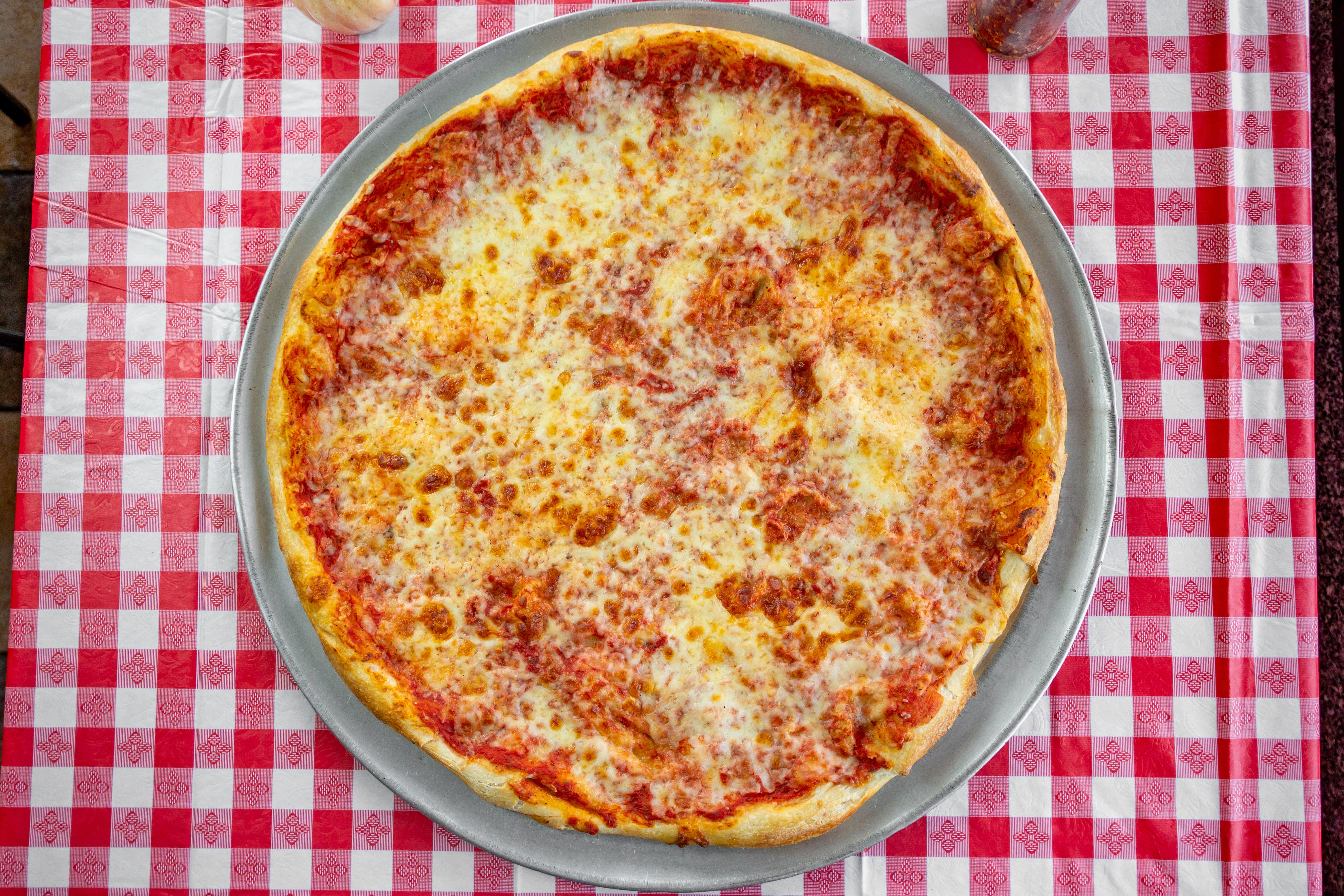 Order NY Style Round Cheese Pizza - Small 14" food online from Pizza Central store, Colonie on bringmethat.com