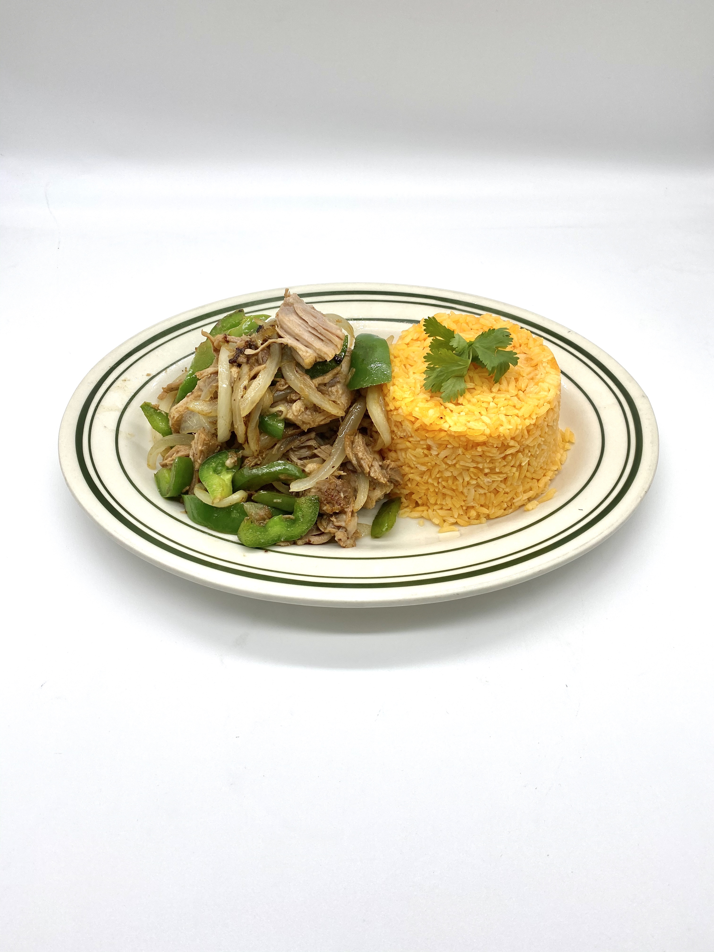 Order 20. Carnitas over Rice food online from Tacos Y Jugos Genesis store, Elmhurst on bringmethat.com