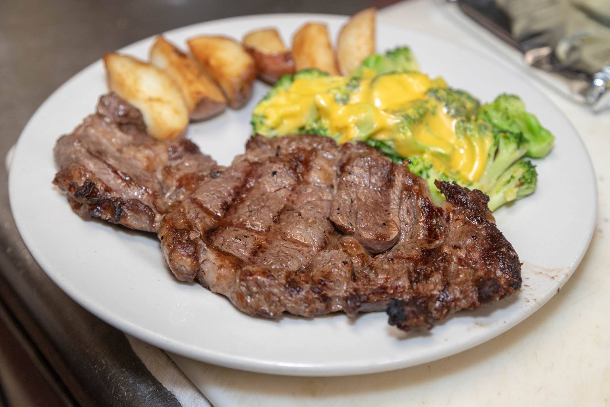 Order Steak alla Griglia - Steaks food online from Gino's Pizzeria store, Jersey City on bringmethat.com