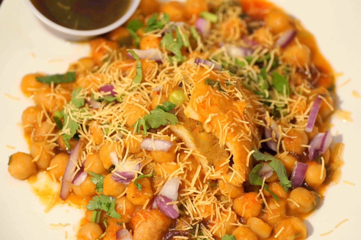 Order Samosa Chaat food online from Indian Street Cafe store, San Jose on bringmethat.com