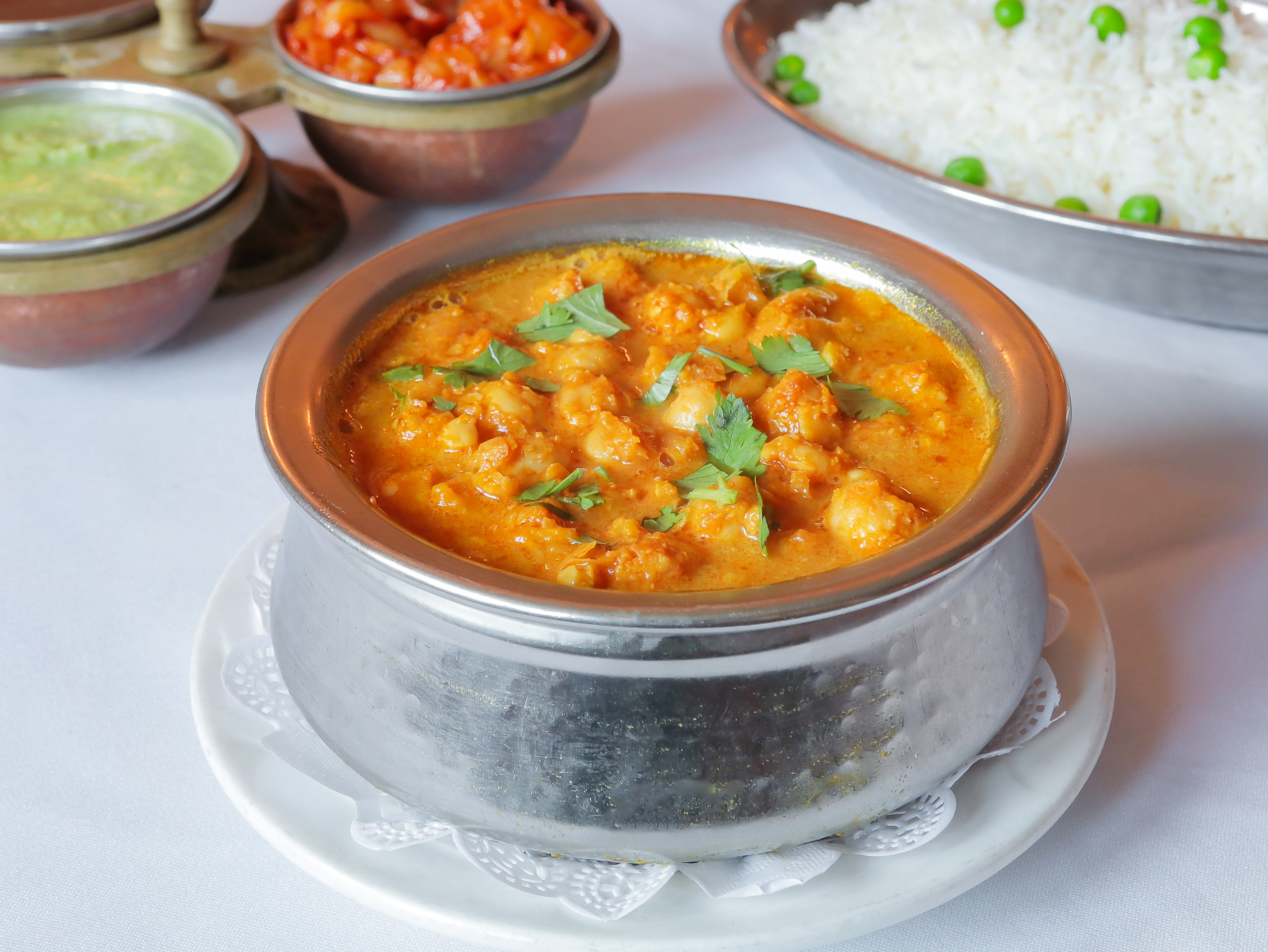Order Chana Masala food online from King of Tandoor Fine Indian Restaurant store, Philadelphia on bringmethat.com