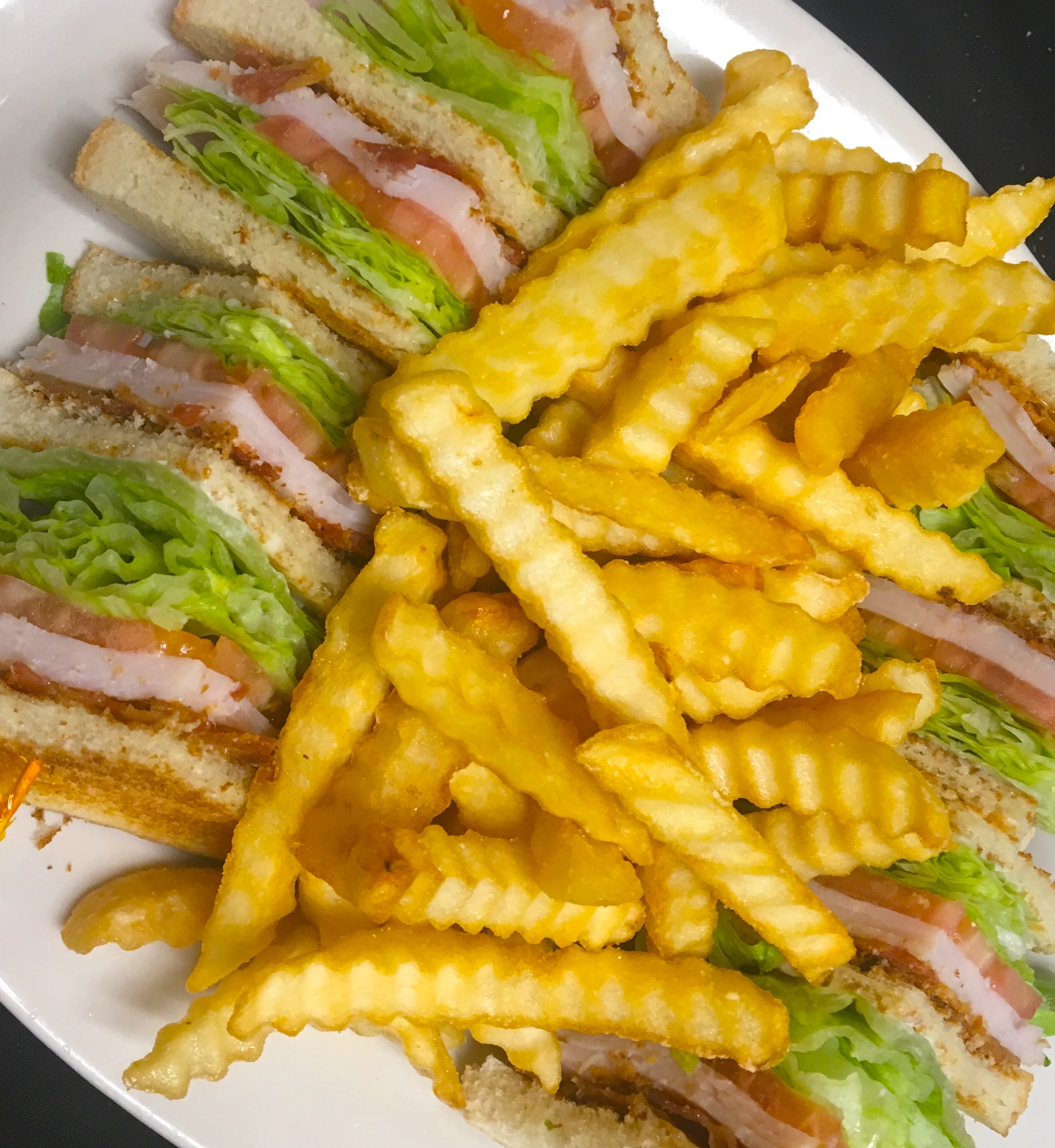 Order Turkey Club Sandwich with Fries food online from Stanley's Grill store, Chicago on bringmethat.com