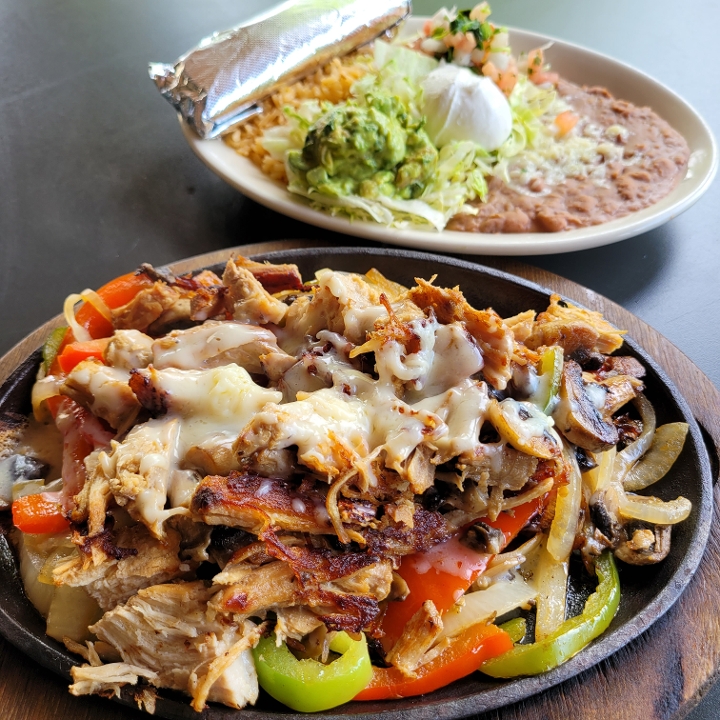 Order Carnitas Fajita food online from Tacos & Tequilas Mexican Grill store, Buford on bringmethat.com