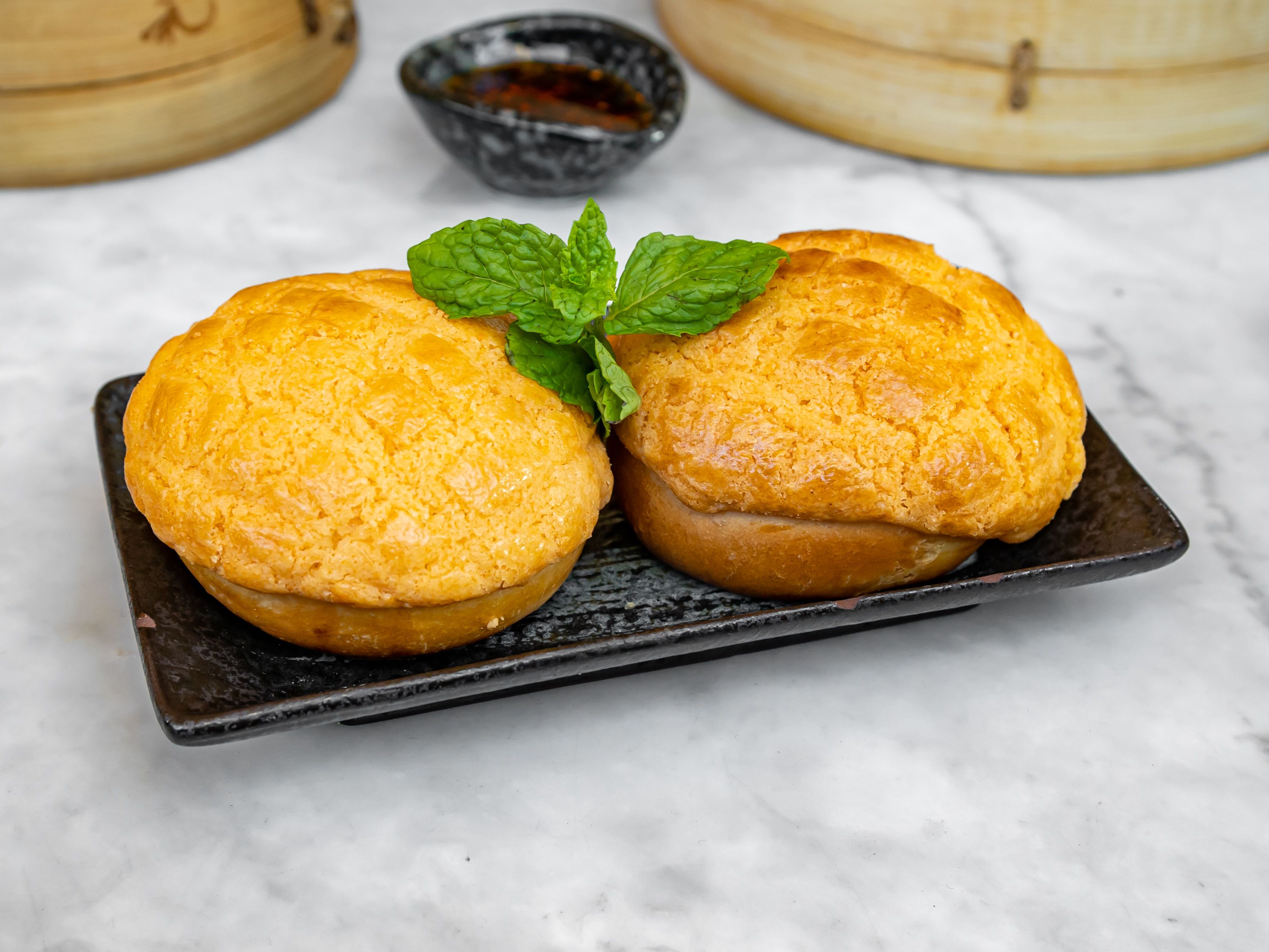 Order Pineapple Bao with Sweet Butter ＆ Egg Cream food online from Iron Teapot Dim Sum store, Los Angeles on bringmethat.com
