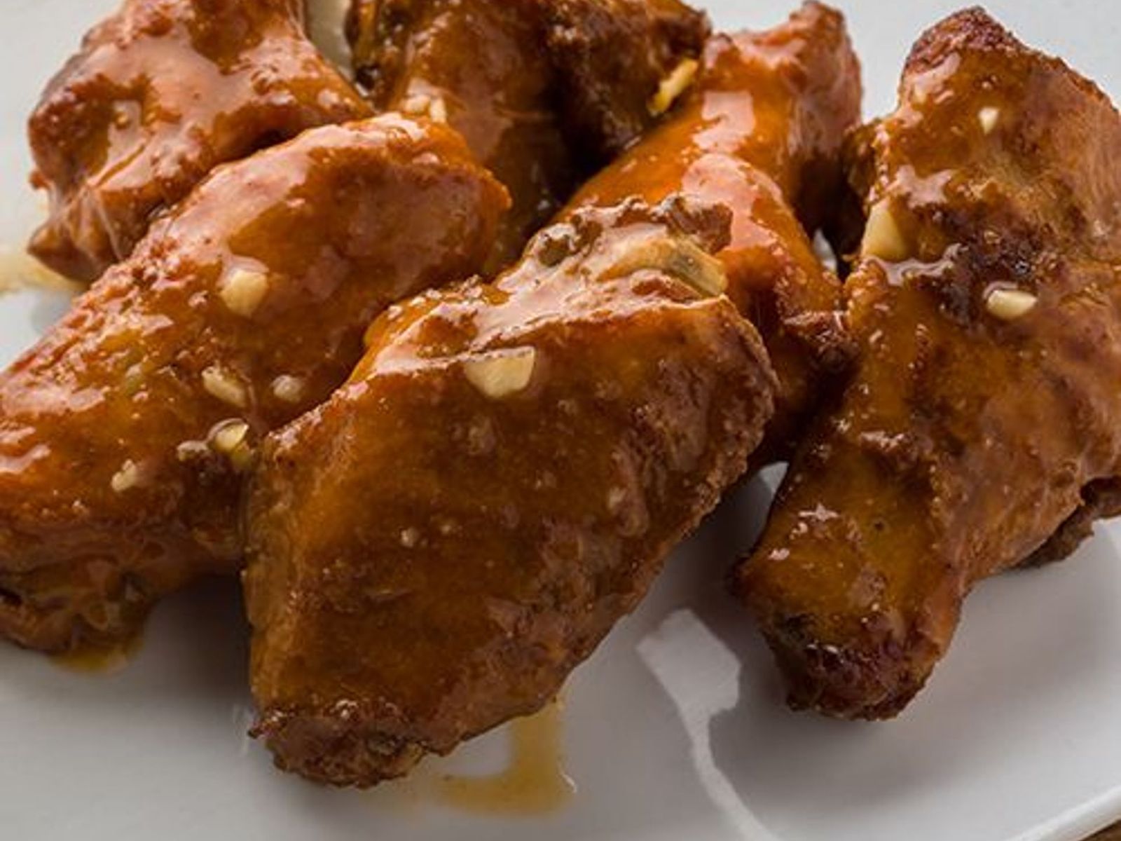 Order Jamaican Jerk Wings food online from Pepperoni's Pizza store, Fulshear on bringmethat.com