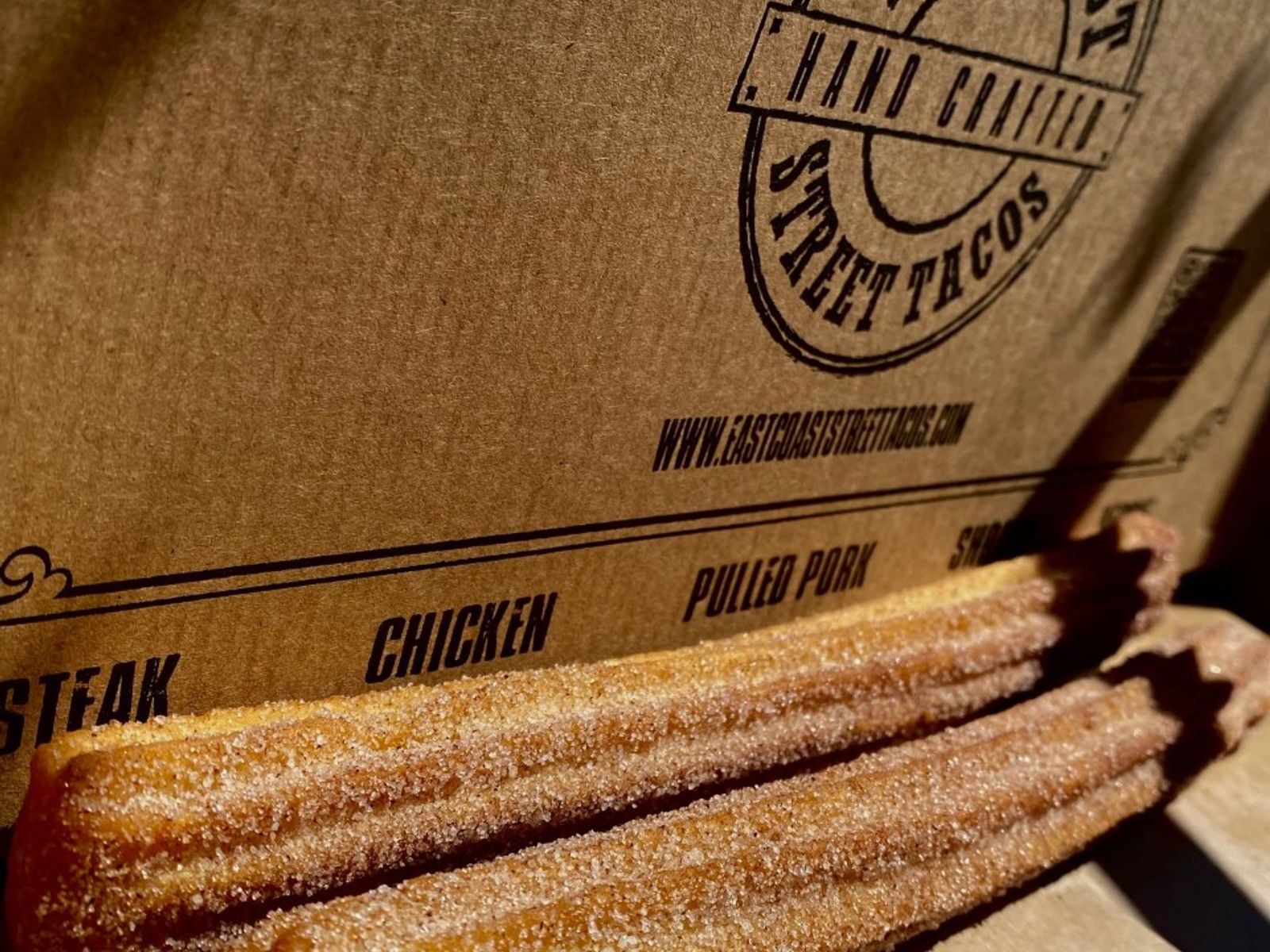 Order 2 Crispy Cinnamon Churros food online from East Coast Street Tacos store, Brooklyn on bringmethat.com