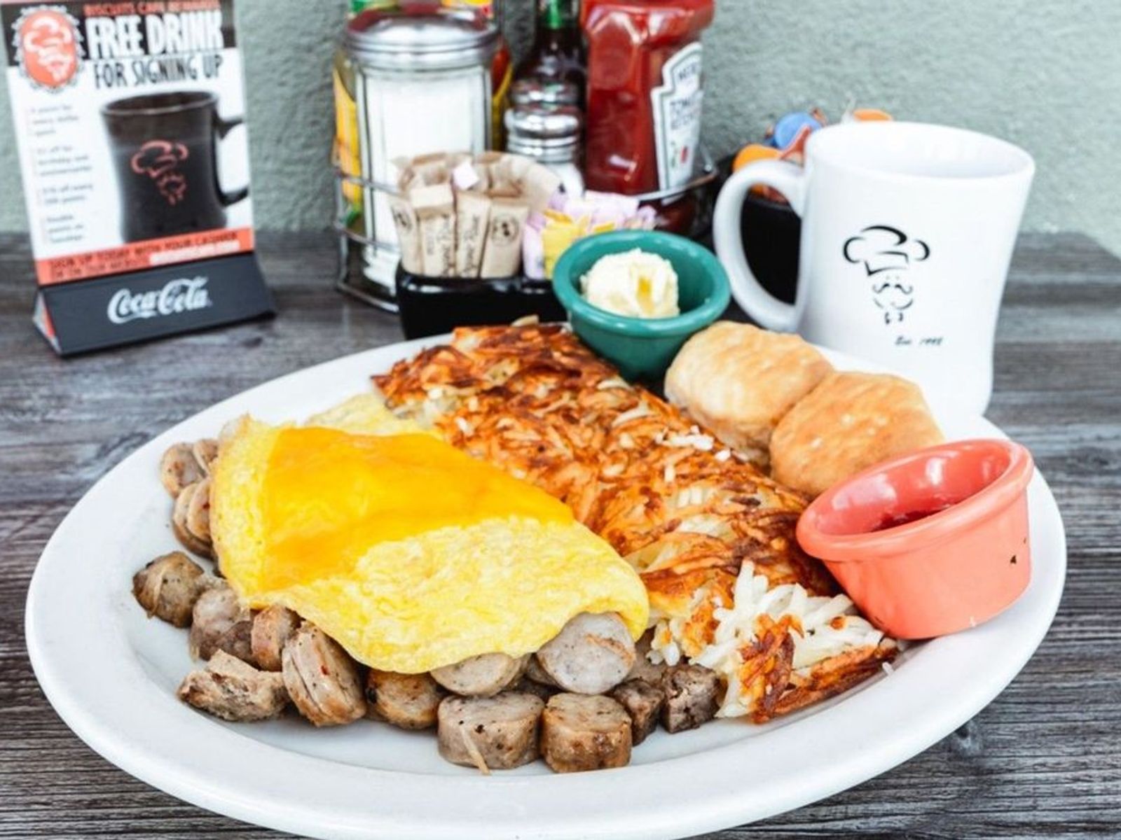 Order Sausage Omelet - OO food online from Biscuits Cafe store, Chandler on bringmethat.com