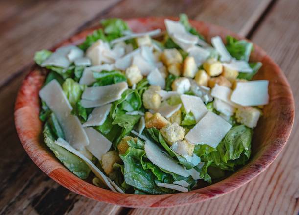 Order Caesar Salad food online from Out Of The Park Pizza store, Anaheim on bringmethat.com