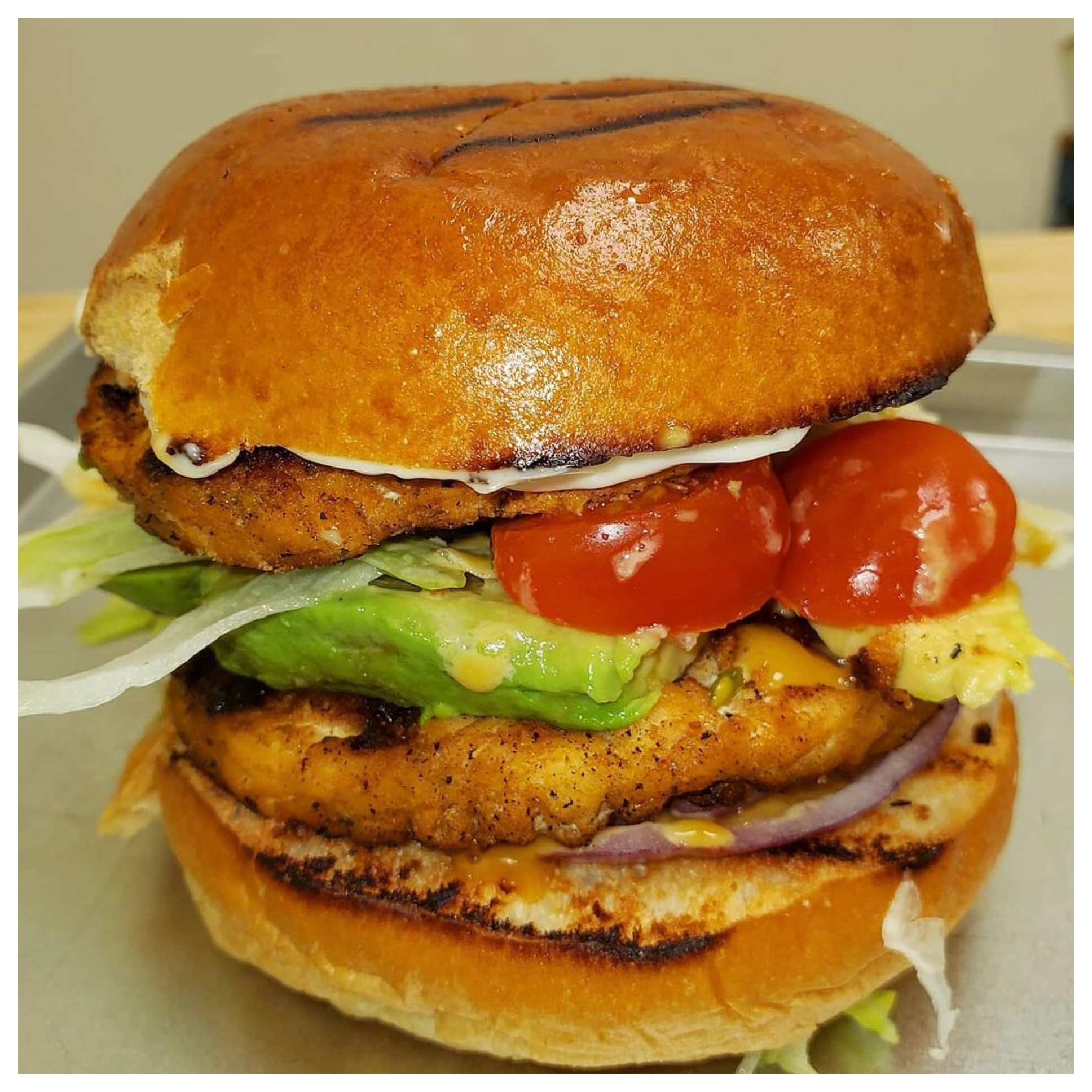 Order Double salmon burger food online from Ochorios Seafood & Caribbean Cuisine store, Hempstead on bringmethat.com