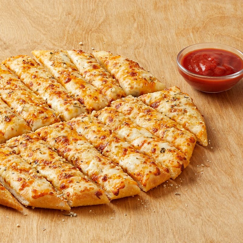 Order Garlic Cheesebread - Medium food online from Pizza Inn store, Carlsbad on bringmethat.com