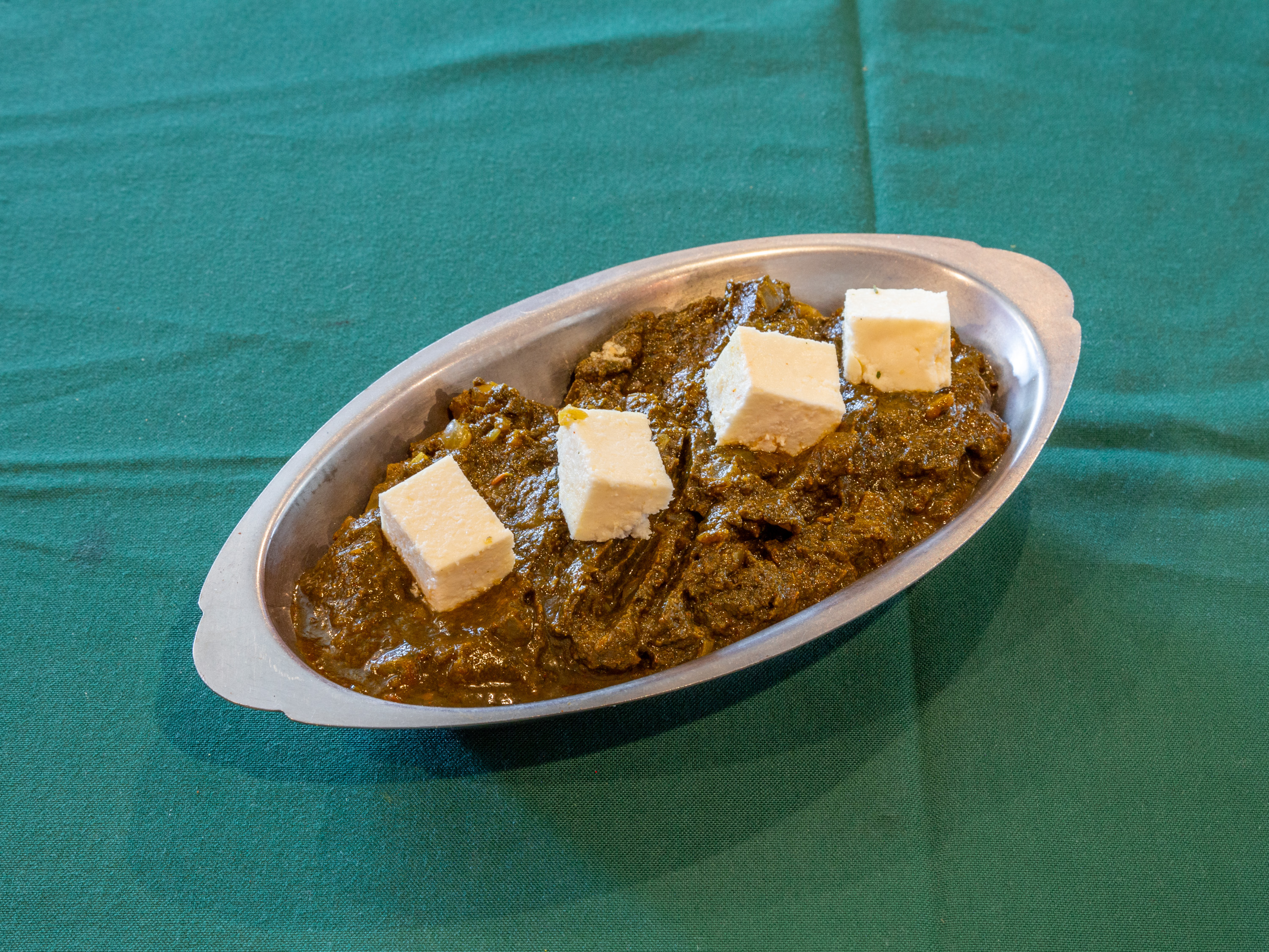 Order Goat Curry food online from Flavors Of India store, Hesperia on bringmethat.com