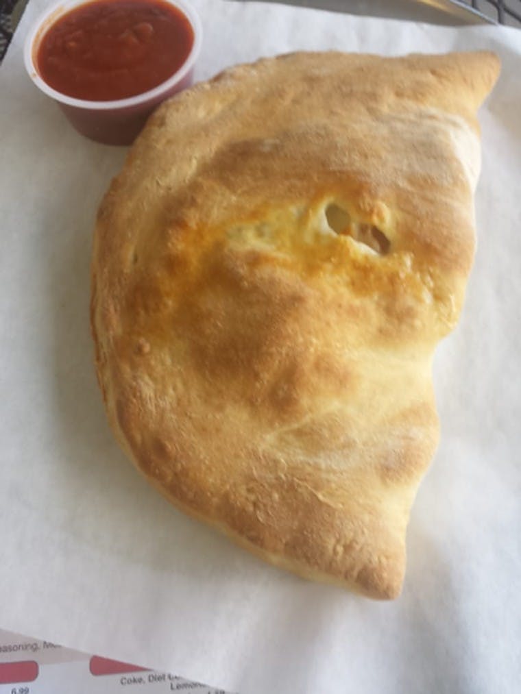 Order Cheese Calzone - Calzone food online from Michael's Pizza store, Calabasas on bringmethat.com