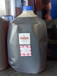 Order Sweet Tea - Gallon food online from Idk? Cafe + Catering store, Rogers on bringmethat.com