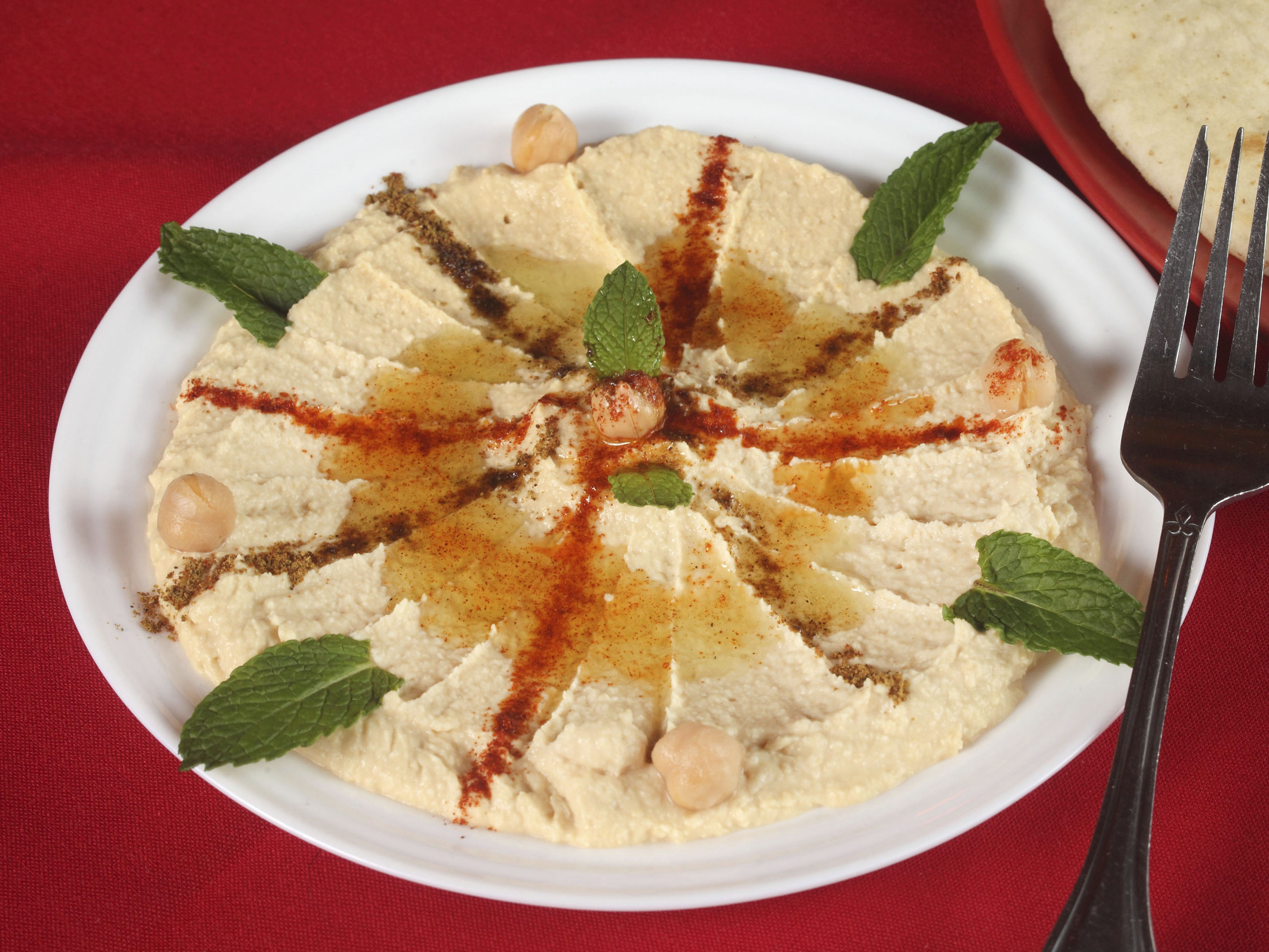 Order Side Hummus food online from Habiba Mediterranean Restaurant store, Greenville on bringmethat.com