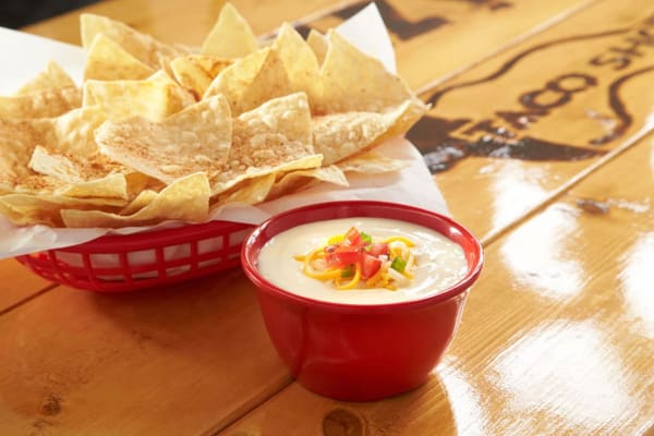 Order Chips & Queso food online from Fuzzy Taco Shop store, Abilene on bringmethat.com