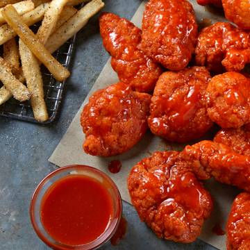 Order 24 Boneless Wings food online from Conviction Chicken and Wings store, Massapequa Park on bringmethat.com
