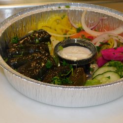 Order 6 Pieces Dolmas food online from Stop-N-Go Gyros store, Fort Worth on bringmethat.com