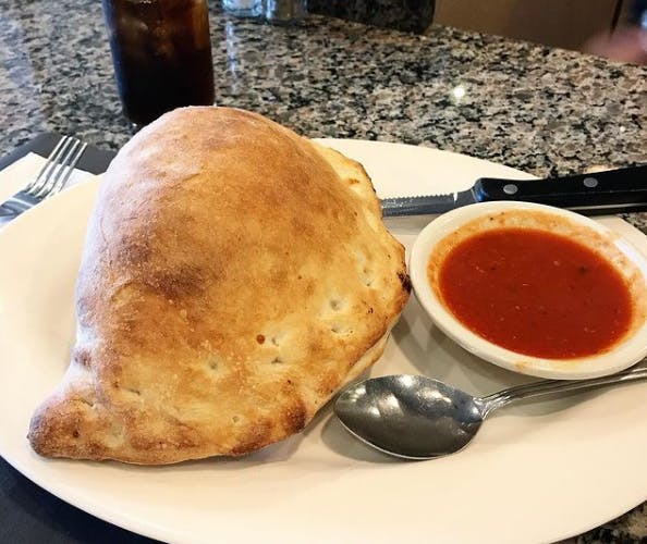 Order Cheese Calzone - Calzone food online from Phil's Pizzeria & Restaurant store, Montvale on bringmethat.com