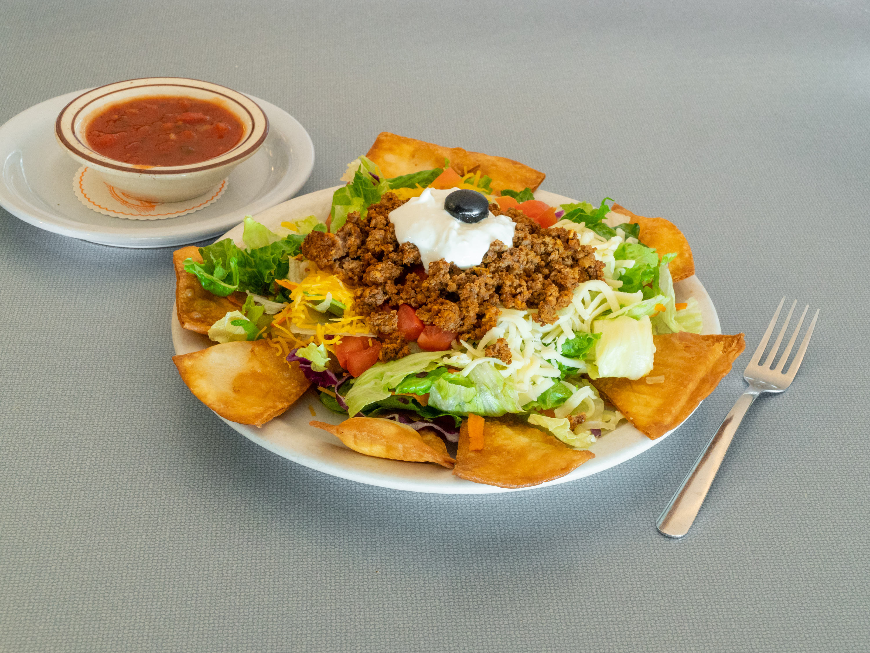 Order Taco Salad food online from Waffle Shop store, Jackson on bringmethat.com