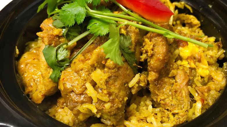 Order Claypot Turmeric Chicken Rice food online from 11th Tiger store, Danville on bringmethat.com