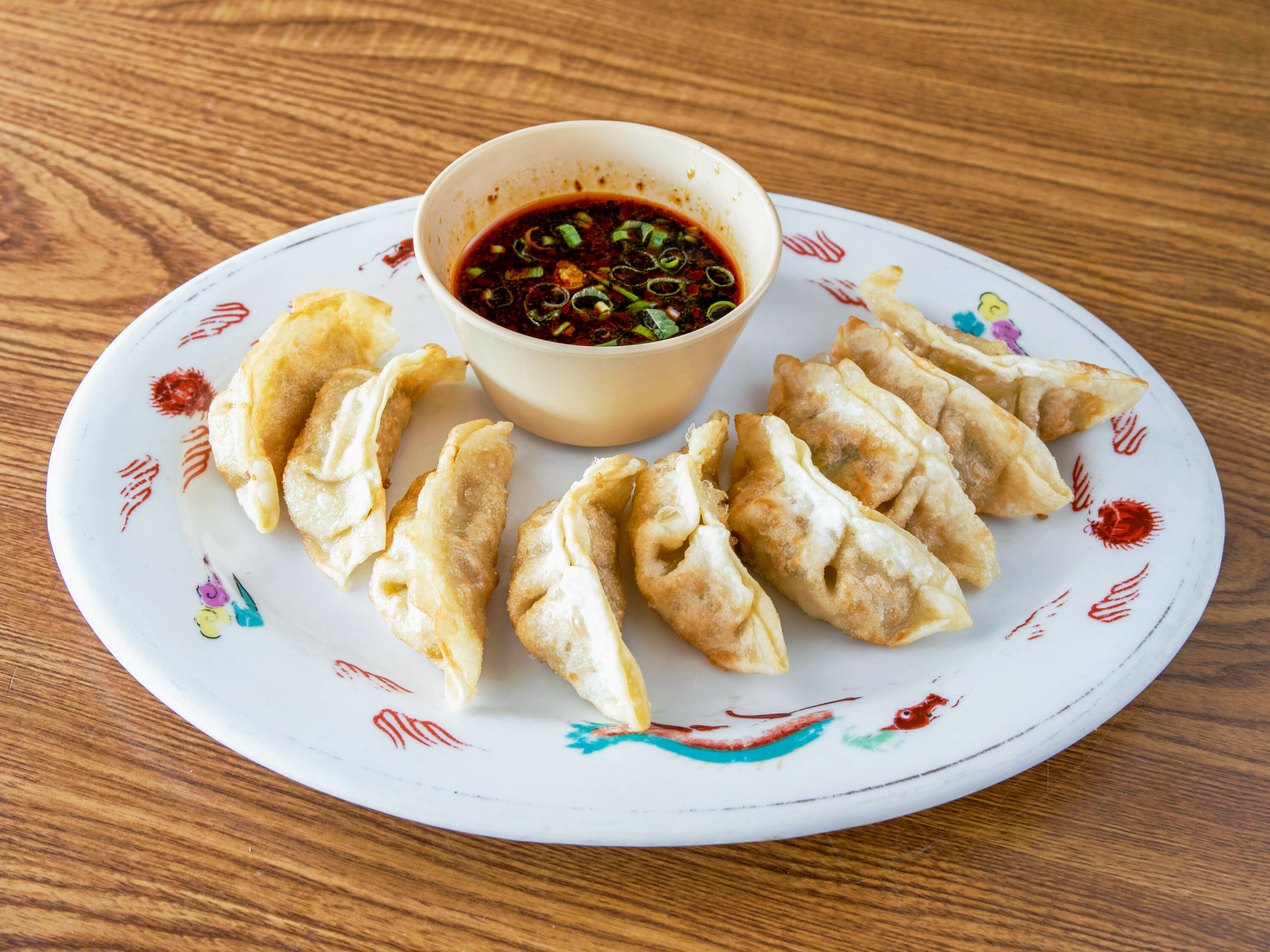 Order 8. Eight Pot Stickers food online from King Wong Chinese store, Phoenix on bringmethat.com