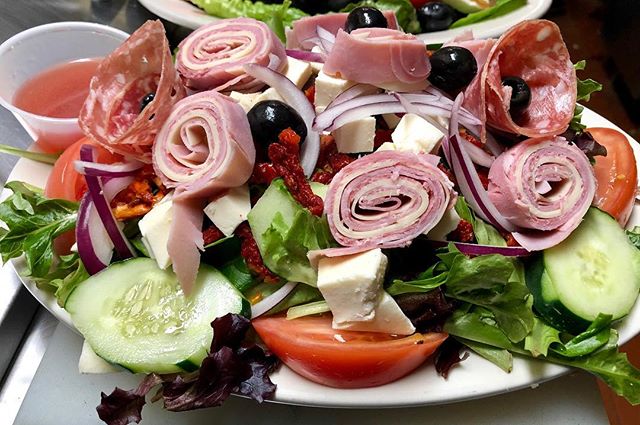 Order Calabria Salad food online from Calabria Pizza store, Oradell on bringmethat.com
