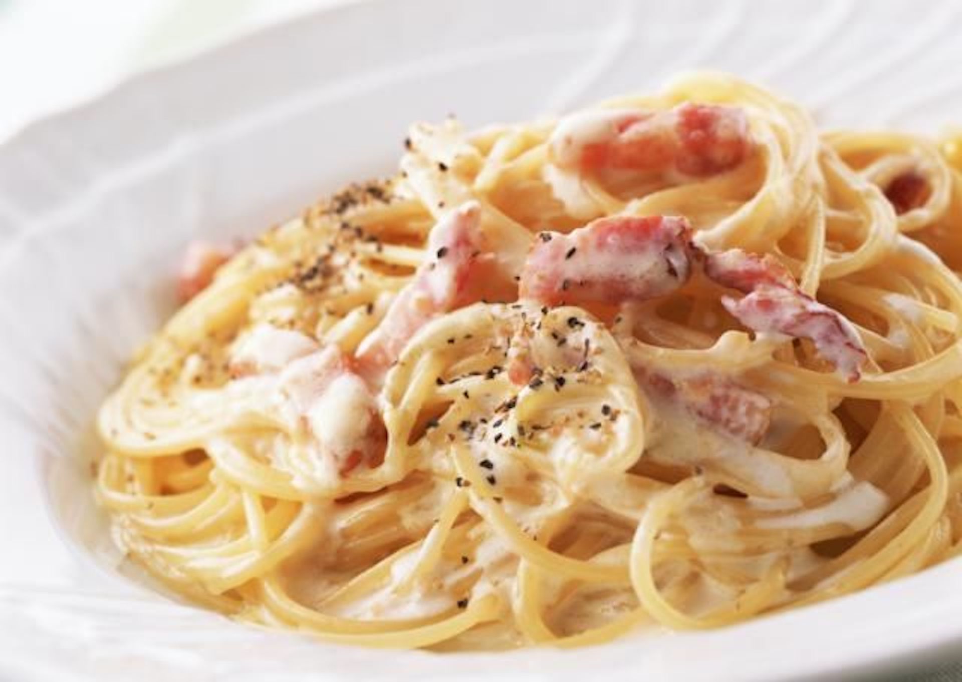 Order 25. Spaghetti Carbonara food online from Fellini Cafe Of Media store, Media on bringmethat.com