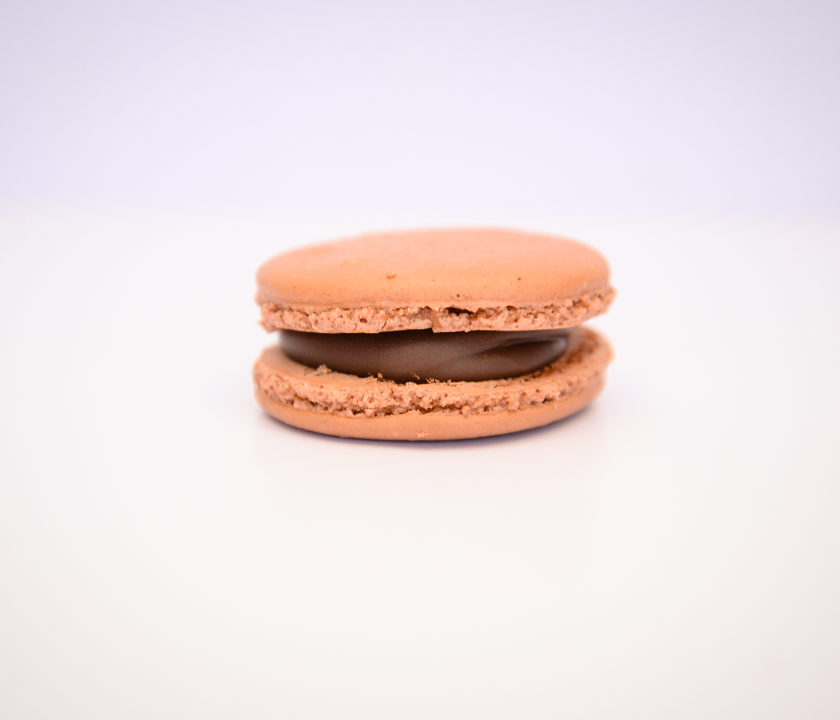 Order Chocolate Ganache Macaron food online from Pietro's Bakery & Cafe store, Frisco on bringmethat.com