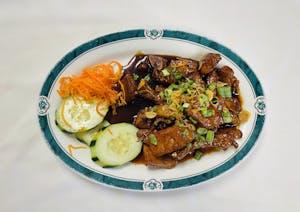 Order 125. Salted & Simmered Pork Chop food online from Lido Restaurant store, Oklahoma City on bringmethat.com