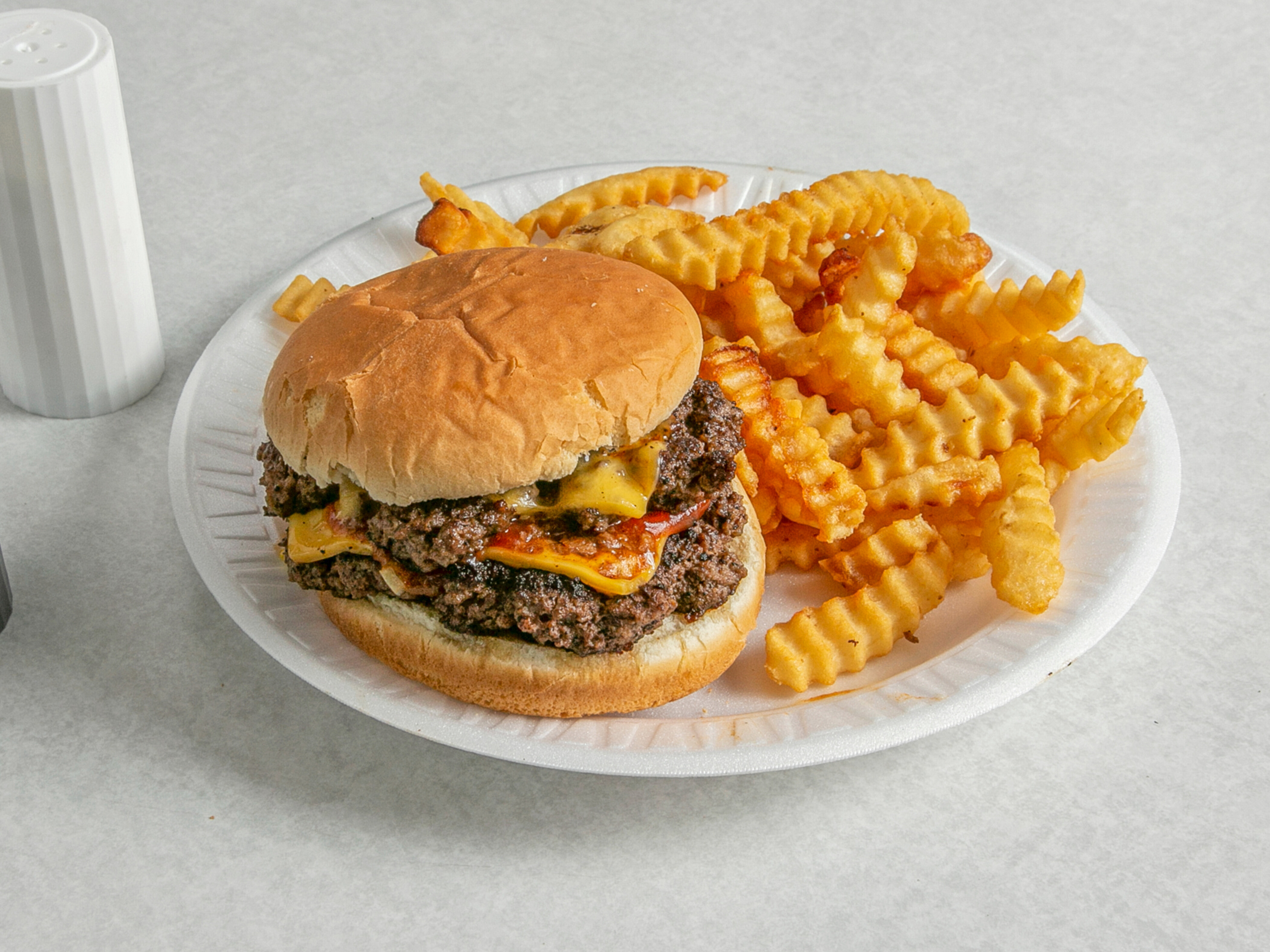 Order DBL CHEESEBURGER WITH FRIES AND REGULAR DRINK food online from Edwards Pharmacy store, Ayden on bringmethat.com